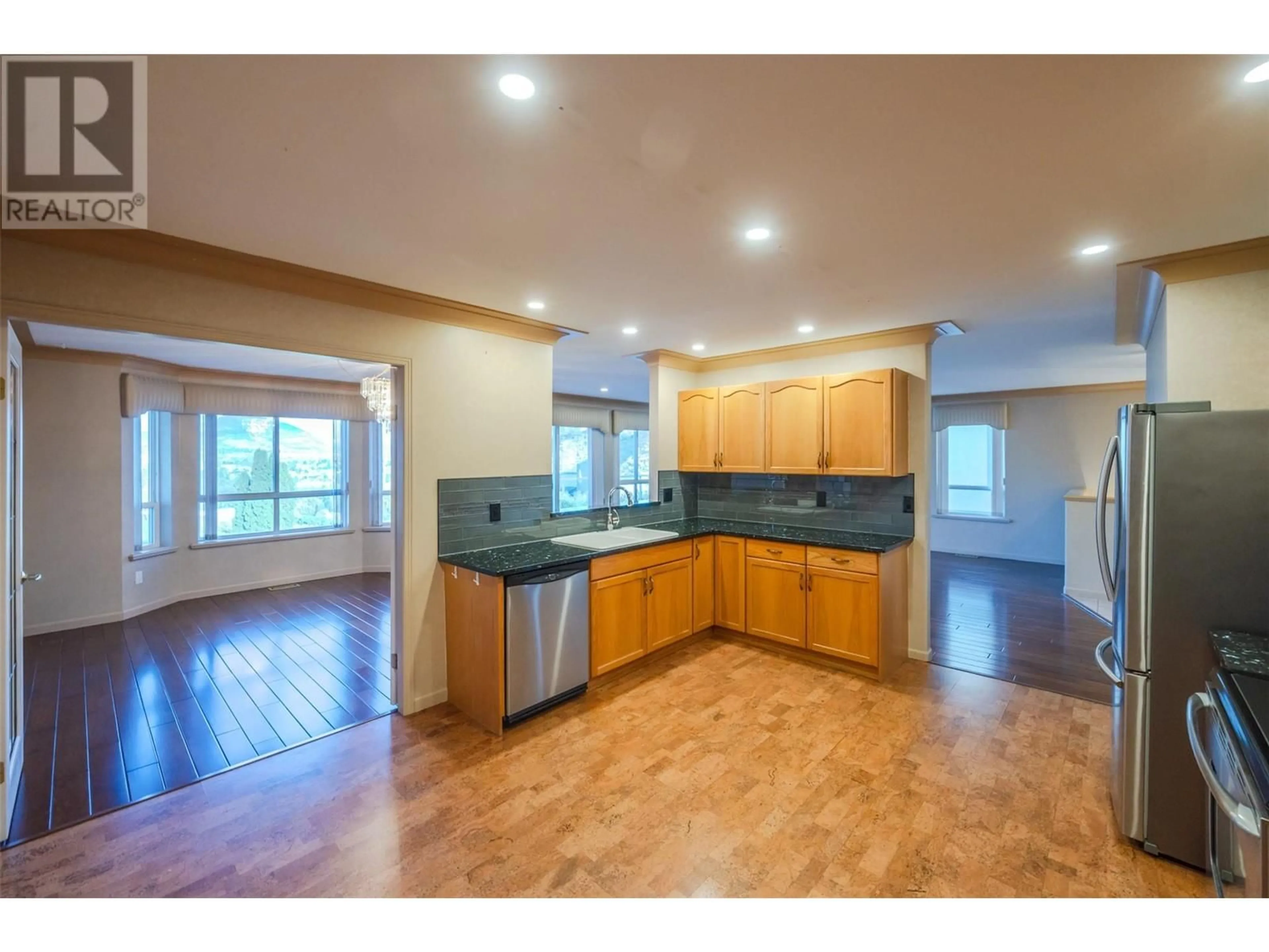 Open concept kitchen for 3948 Finnerty Road Unit# 114, Penticton British Columbia V2A8P8