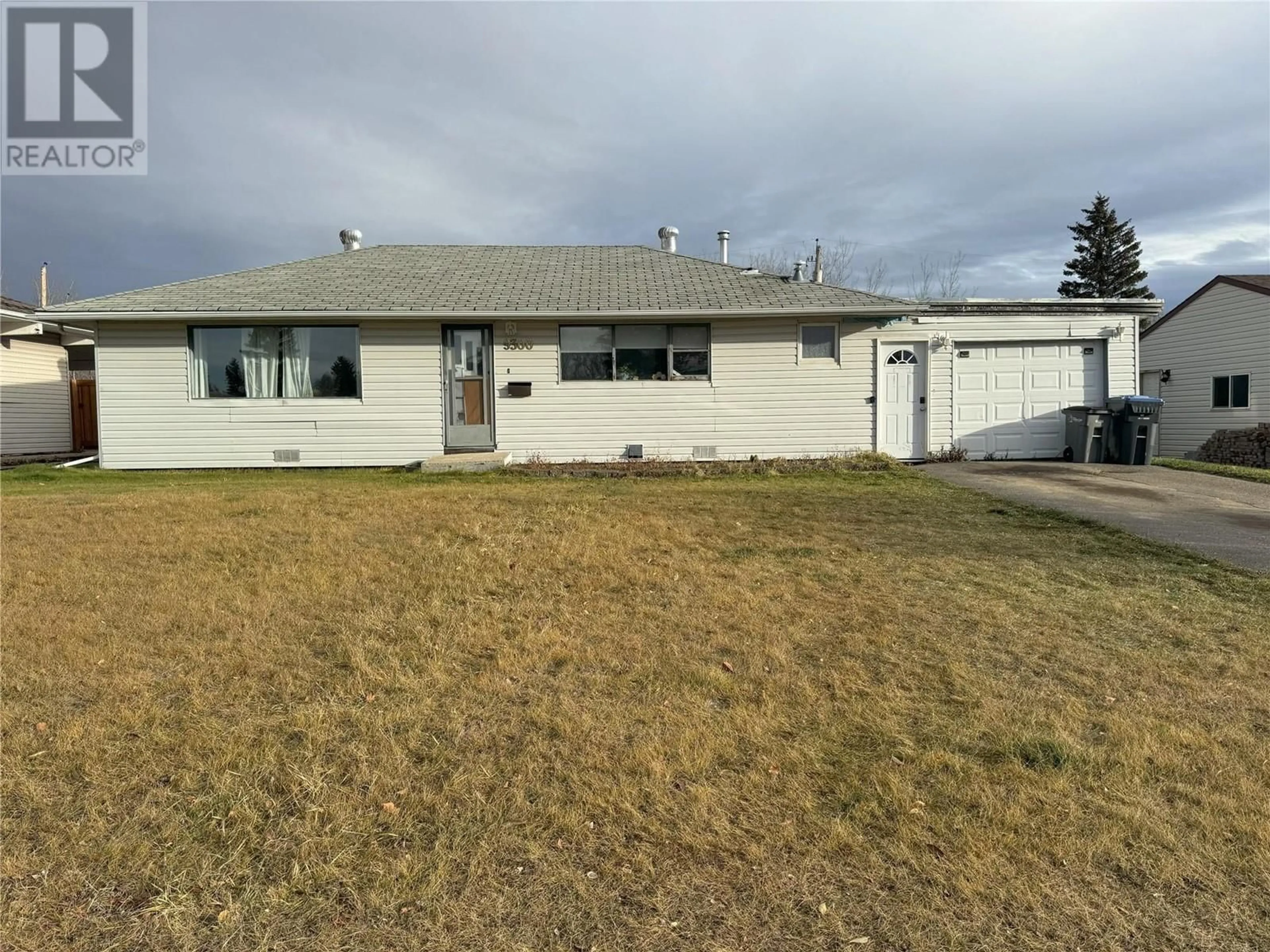 Frontside or backside of a home, the street view for 9300 13 Street, Dawson Creek British Columbia V1G3V8