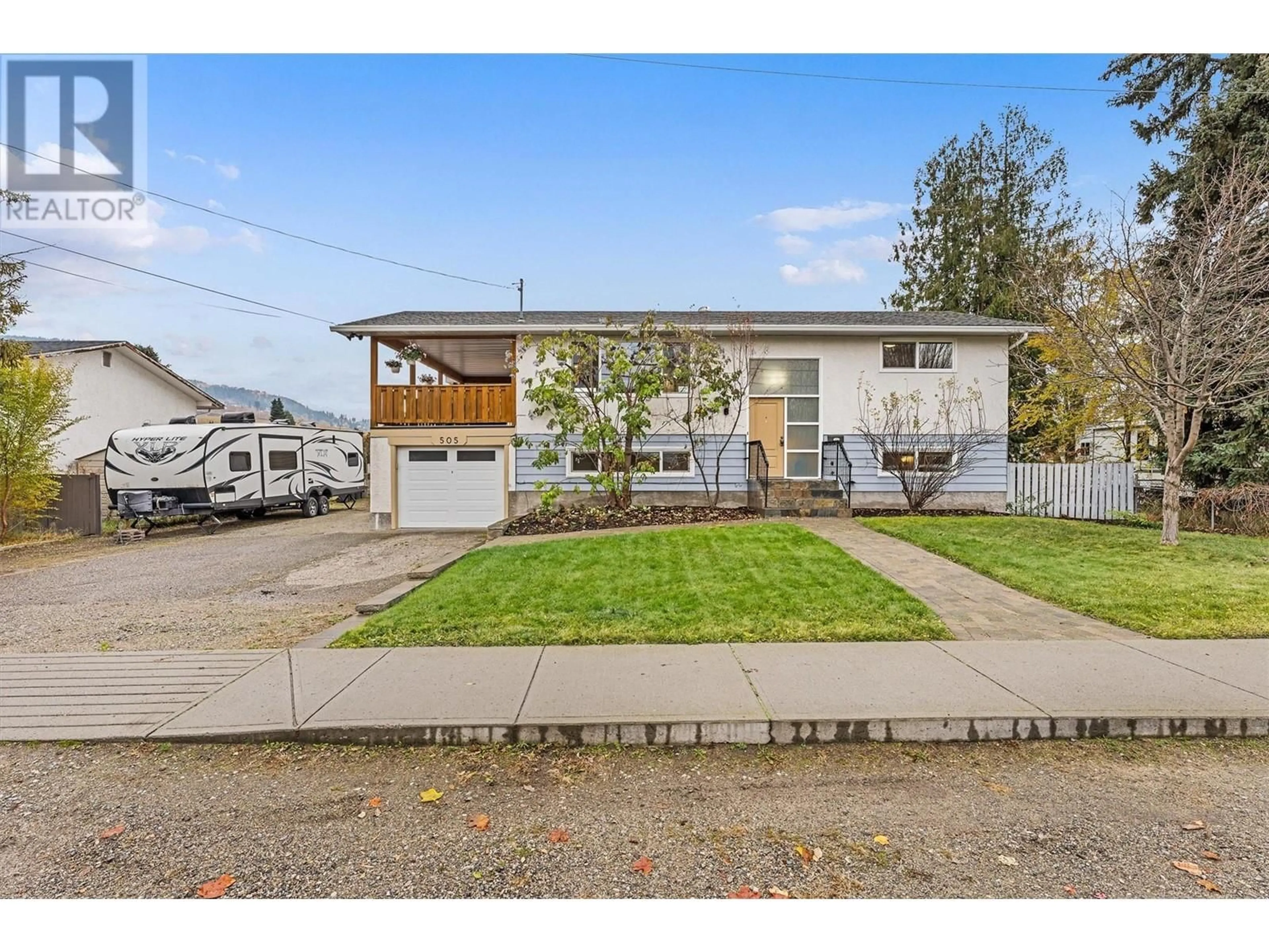 Frontside or backside of a home, the street view for 505 Mugford Road, Kelowna British Columbia V1X2E5