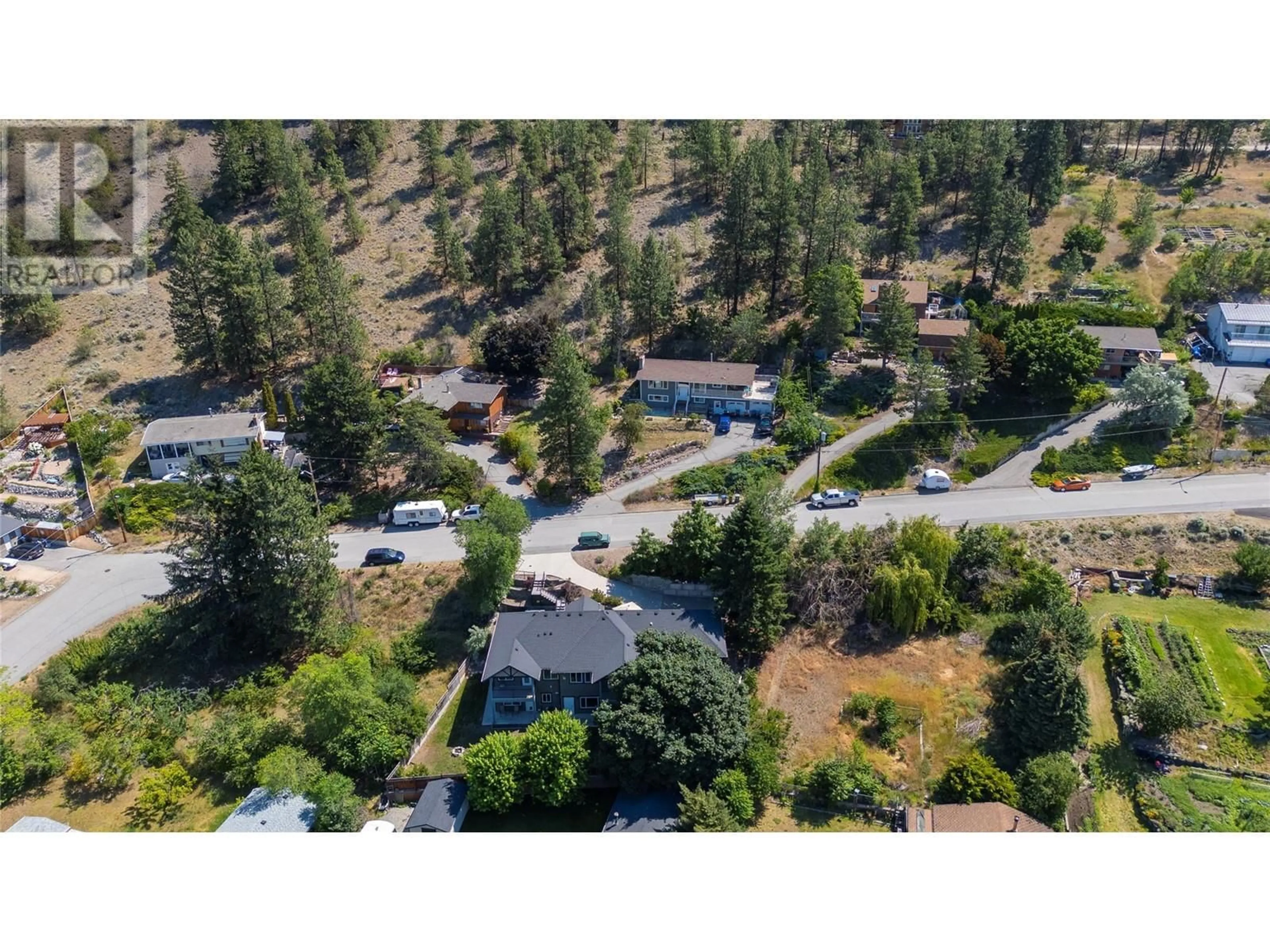 Frontside or backside of a home, the street view for 11014 MOUNTFORD Avenue, Summerland British Columbia V0H1Z2