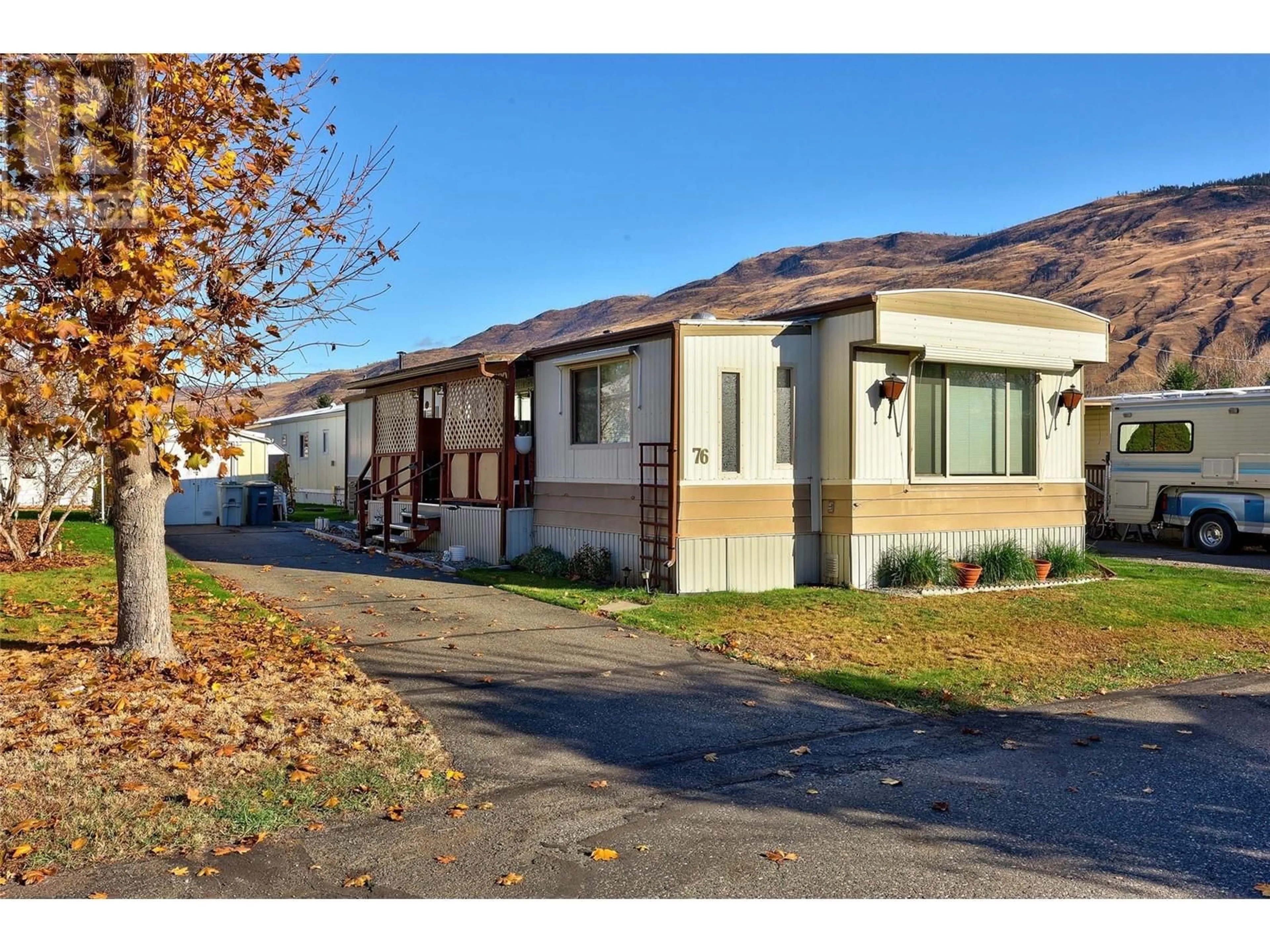 A pic from exterior of the house or condo, the street view for 2400 Oakdale Way Unit# 76, Kamloops British Columbia V2B6W7