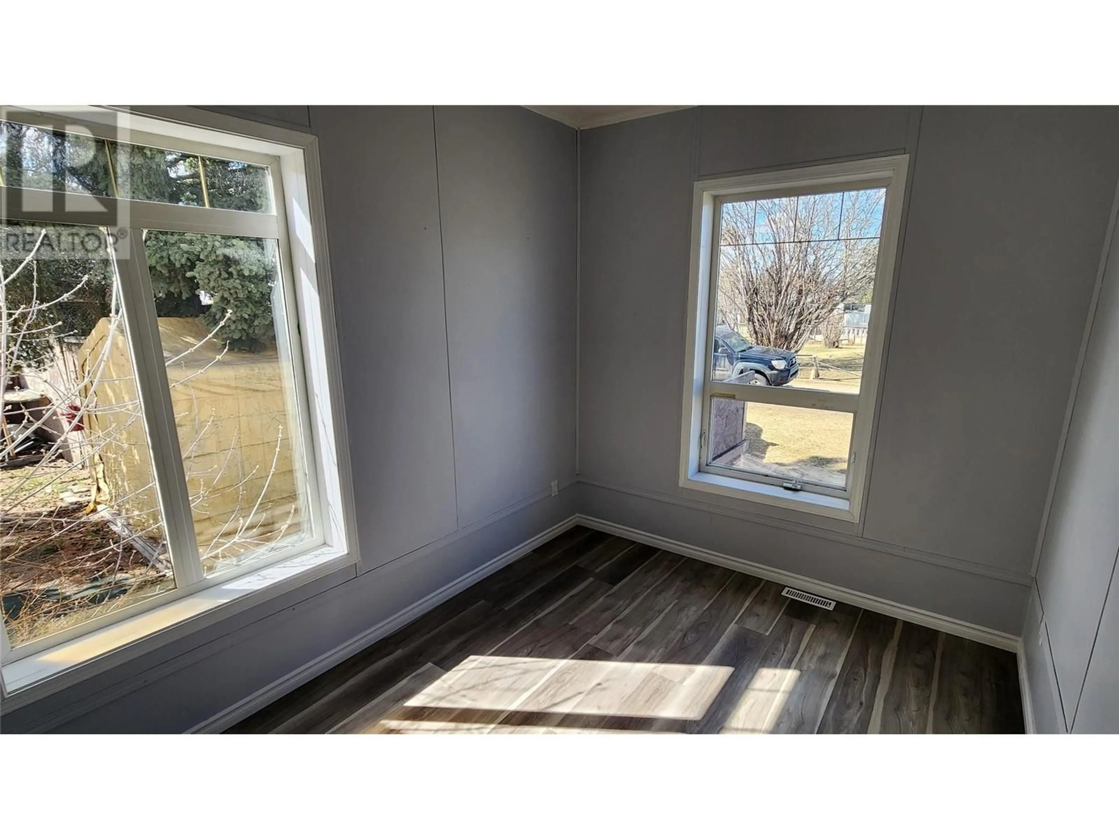 A pic of a room, wood floors for 1413 105 Avenue, Dawson Creek British Columbia V1G2M3