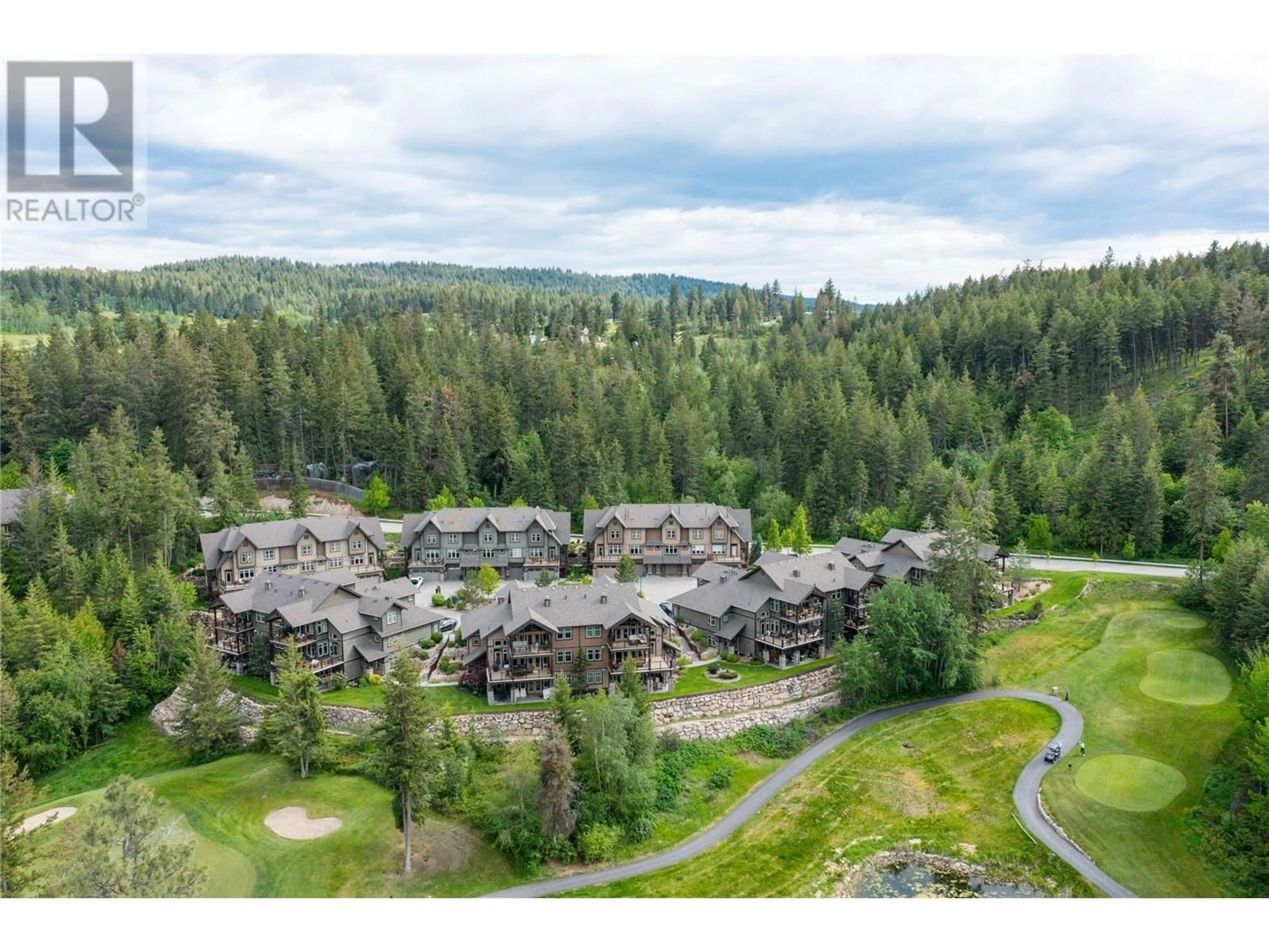 A pic from outside/outdoor area/front of a property/back of a property/a pic from drone, mountain view for 37 - 333 LONGSPOON DRIVE, Vernon British Columbia V1H2L1