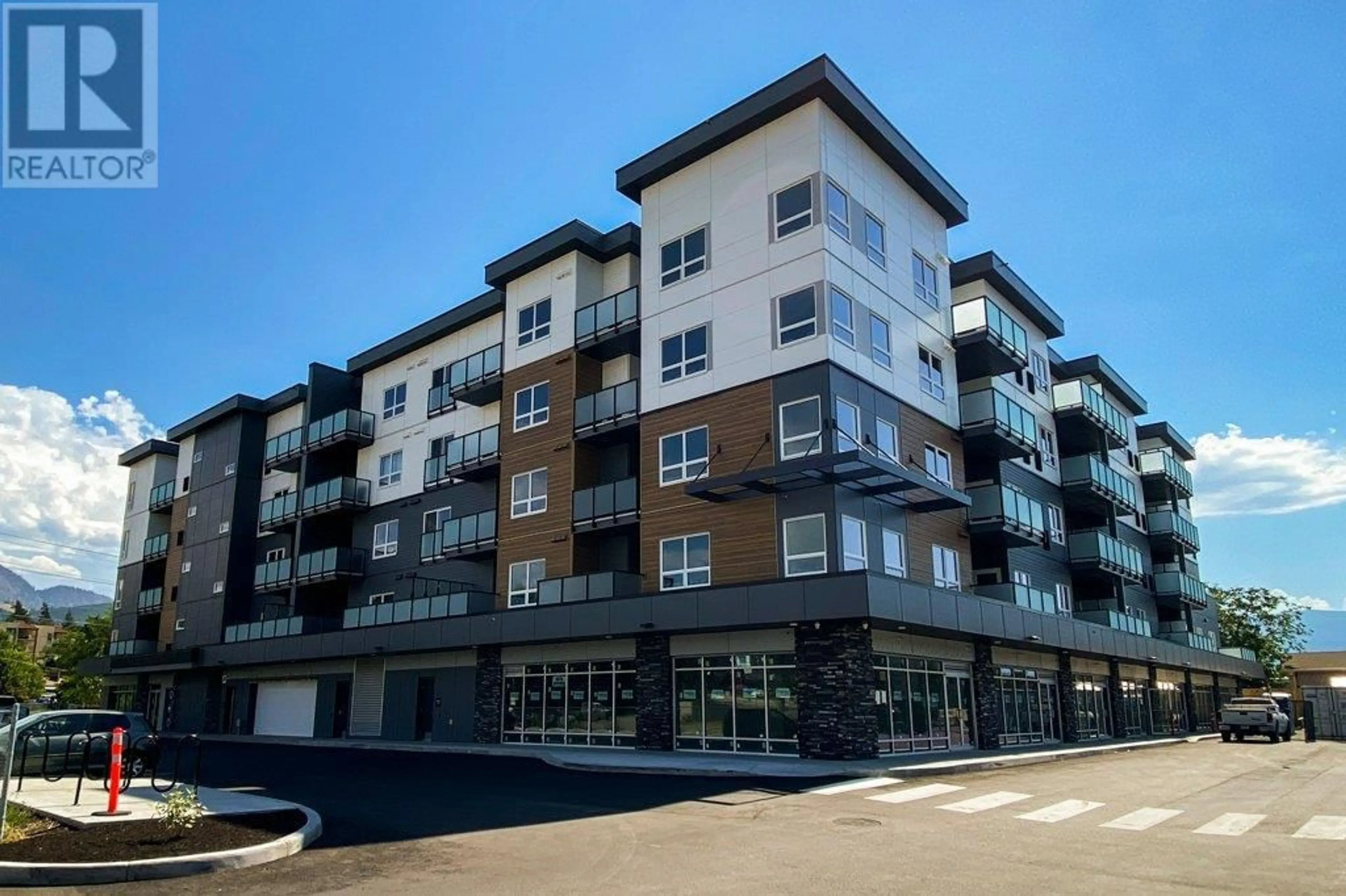 A pic from exterior of the house or condo, the front or back of building for 191 Hollywood Road S Unit# 102, Kelowna British Columbia V1V2X9