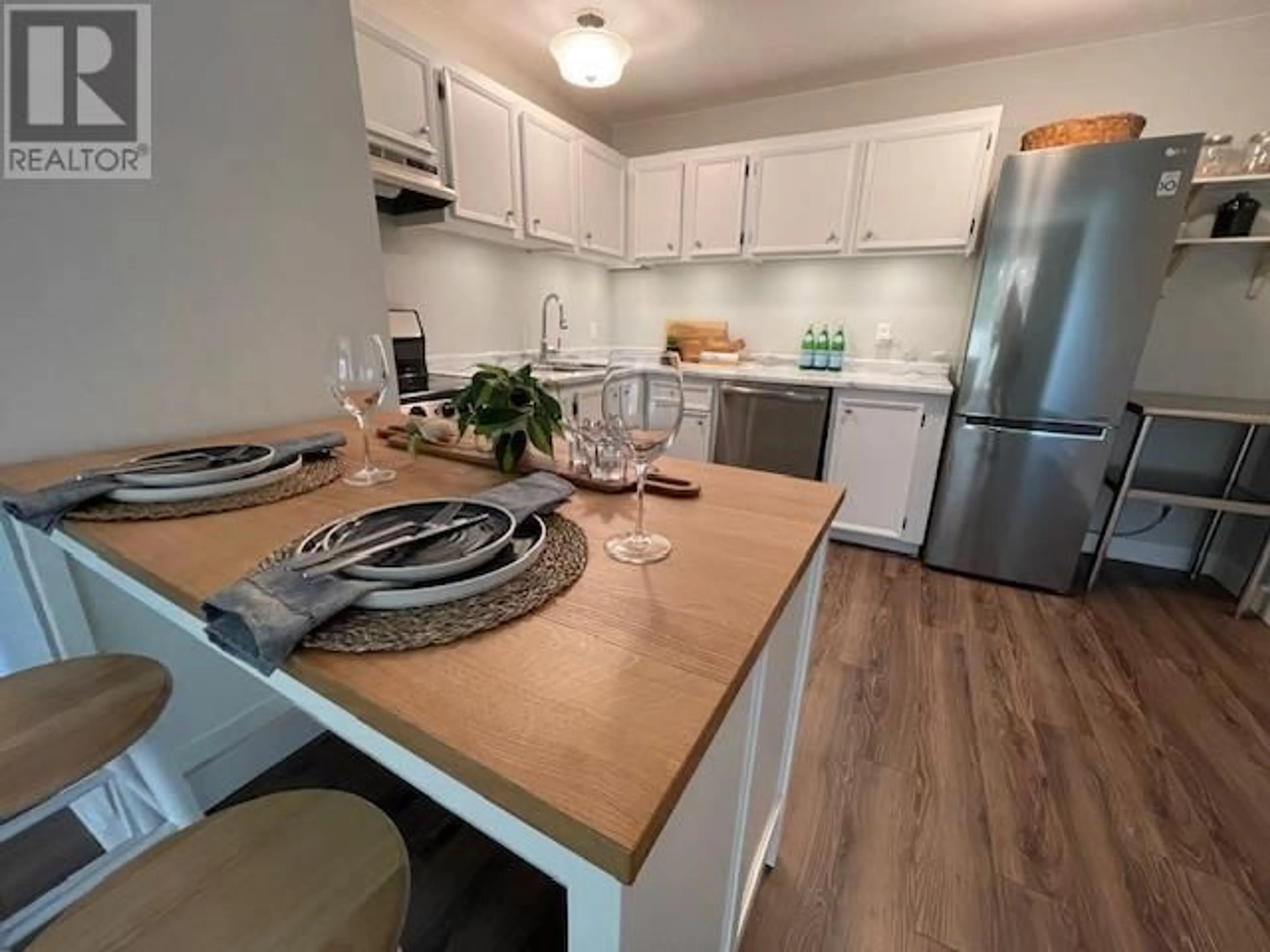 Open concept kitchen for 150 SKAHA Place Unit# 201, Penticton British Columbia V2A7K1