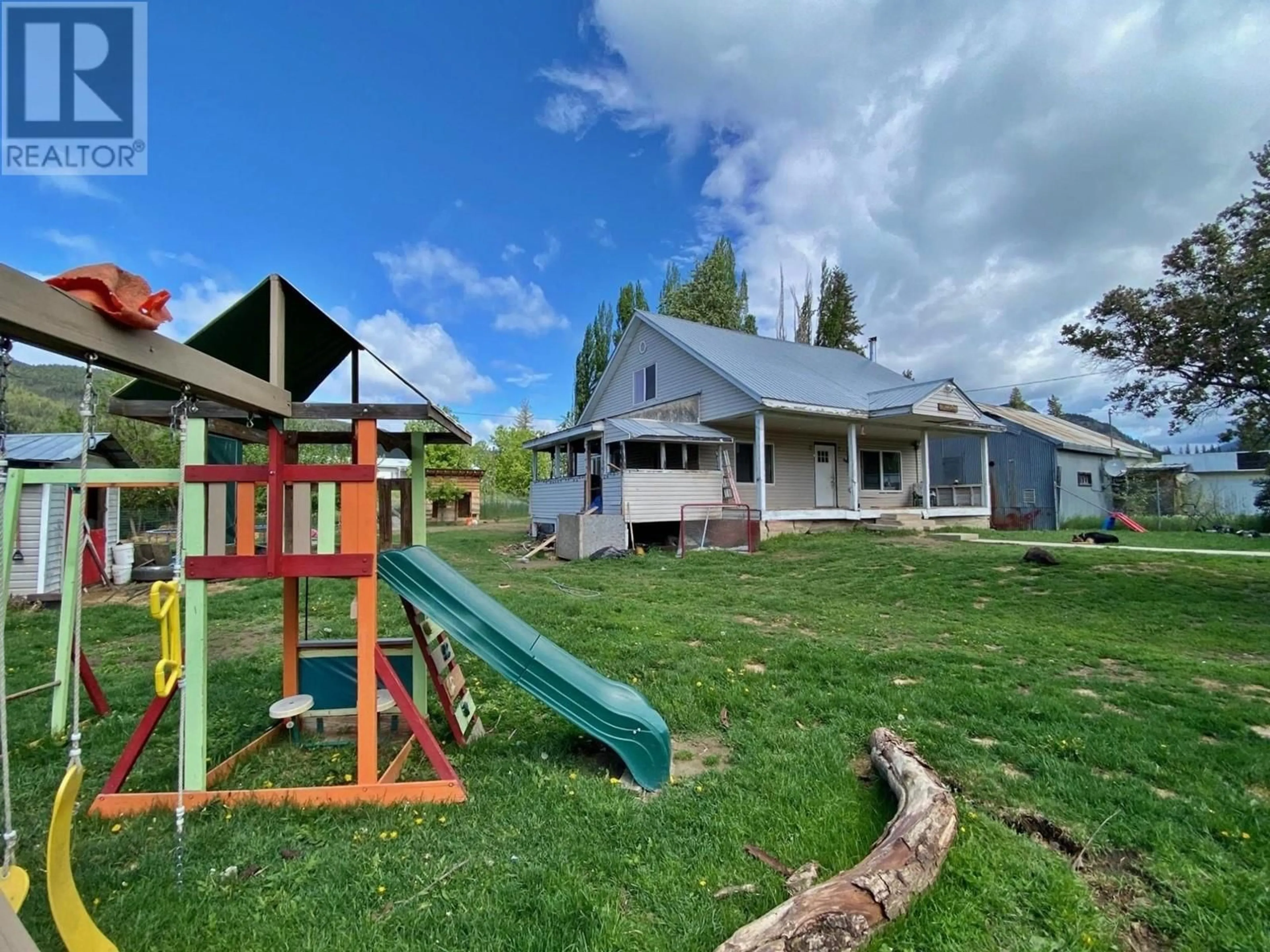 Frontside or backside of a home, the fenced backyard for 9857-9861 Church Street, Little Fort British Columbia V0E2C0