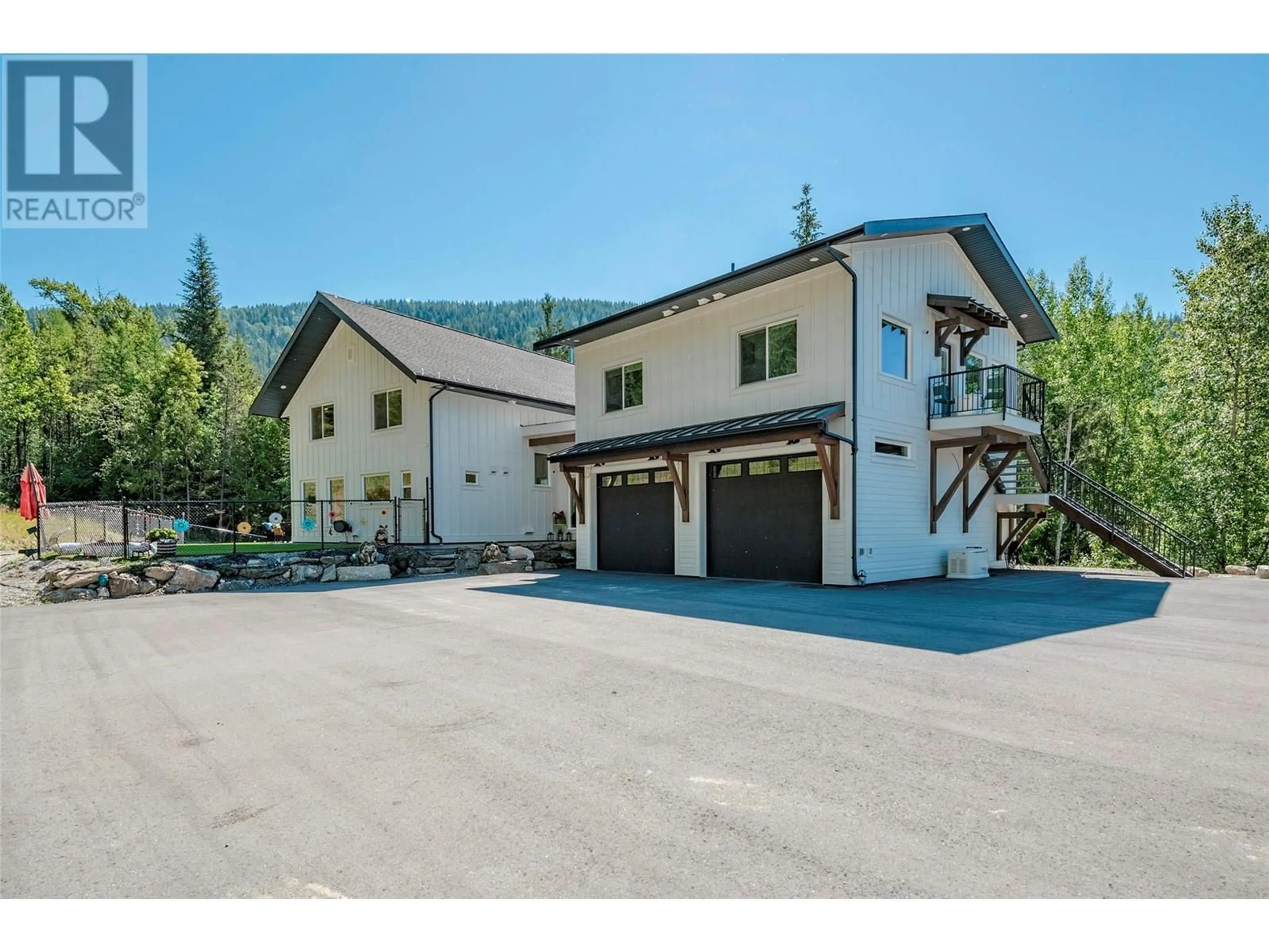 A pic from outside/outdoor area/front of a property/back of a property/a pic from drone, mountain view for 8735 FORSBERG ROAD, Vernon British Columbia V1B3M6
