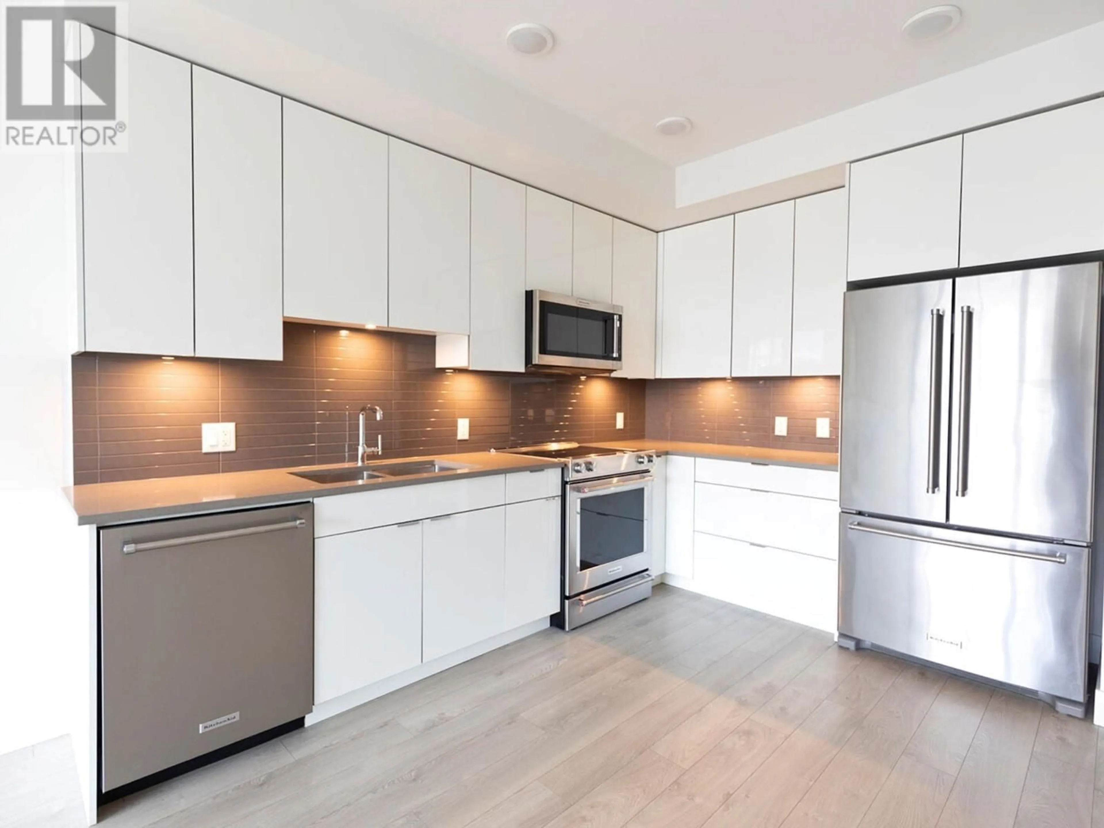 Open concept kitchen for 1232 Ellis Street Unit# 907, Kelowna British Columbia V1Y1Z4