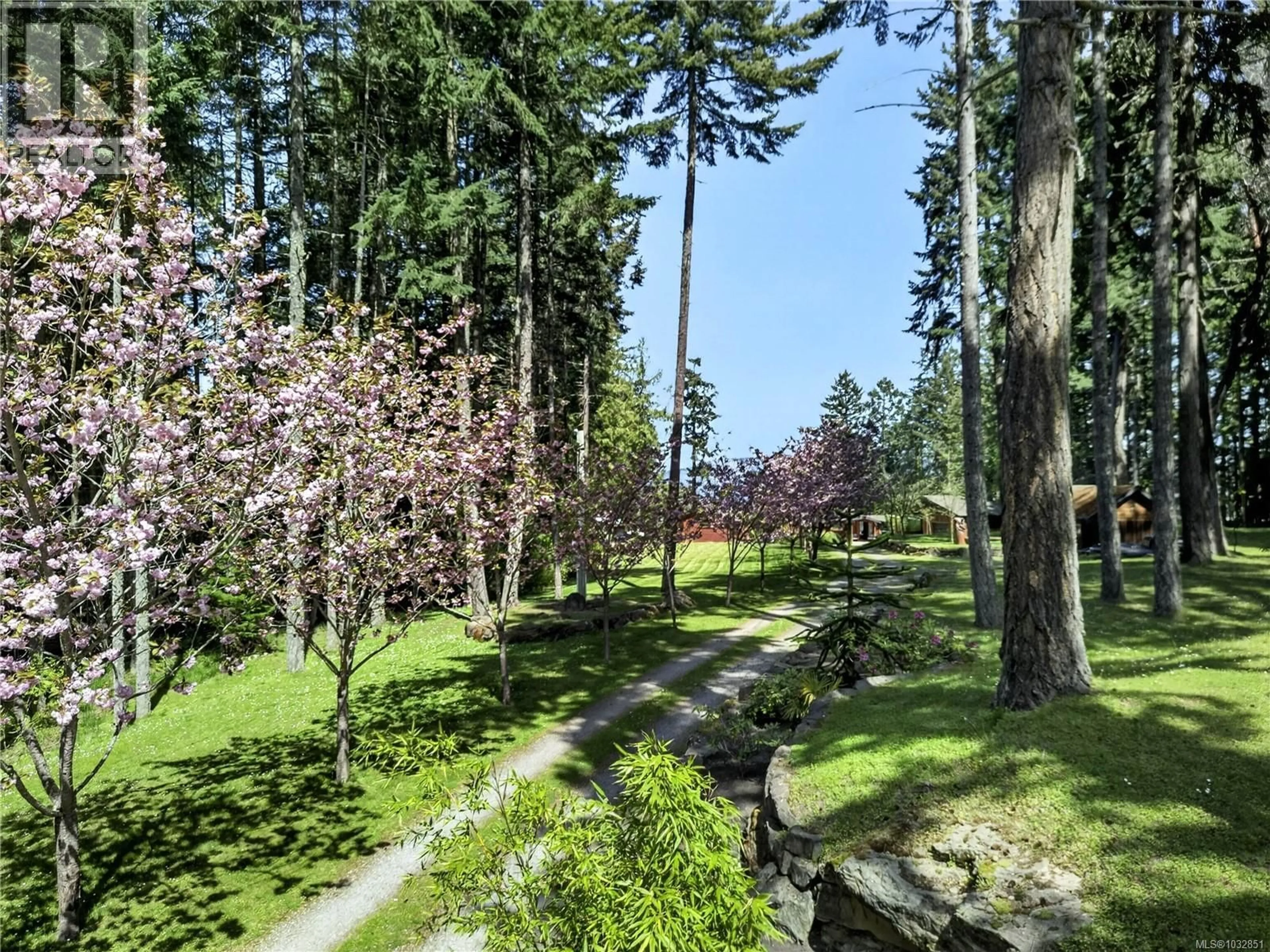 A pic from outside/outdoor area/front of a property/back of a property/a pic from drone, forest/trees view for 103 GREER PLACE, Salt Spring British Columbia V8K1A9