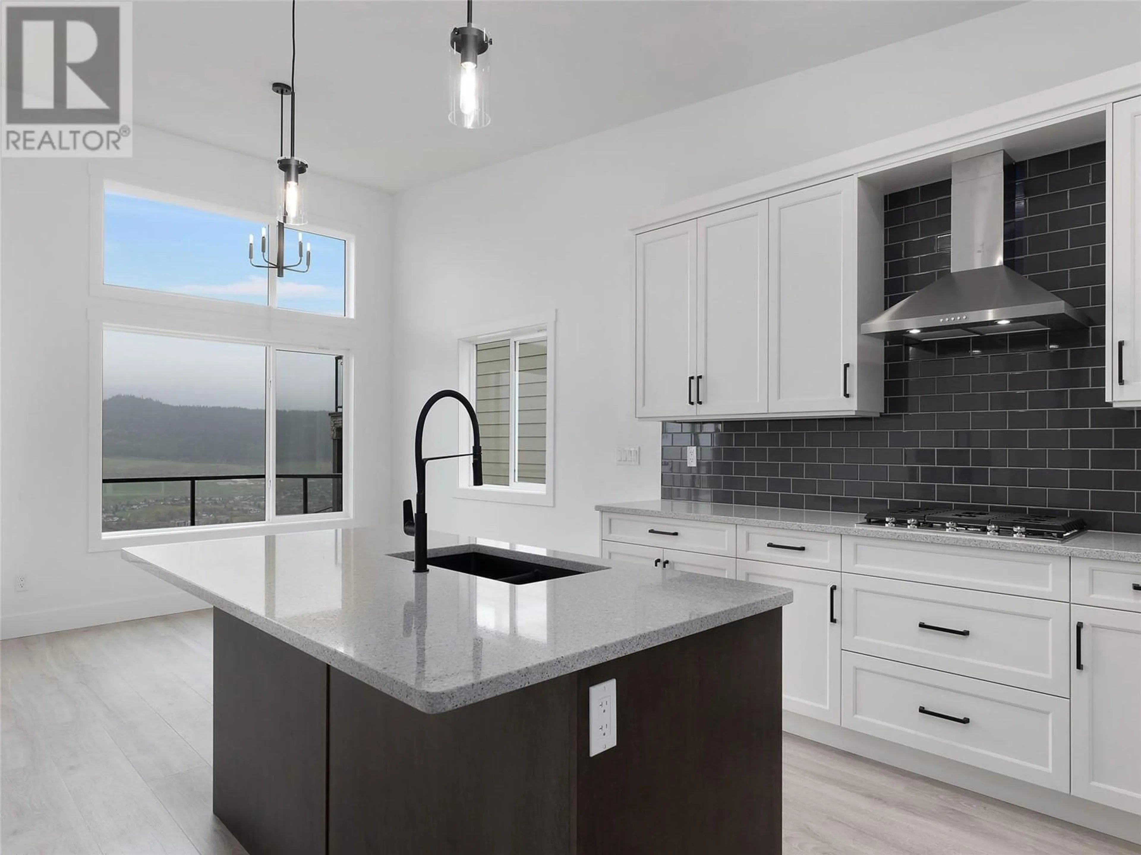 Contemporary kitchen, wood floors, mountain for 7735 Okanagan Boulevard Unit# 7, Vernon British Columbia V1H0A7