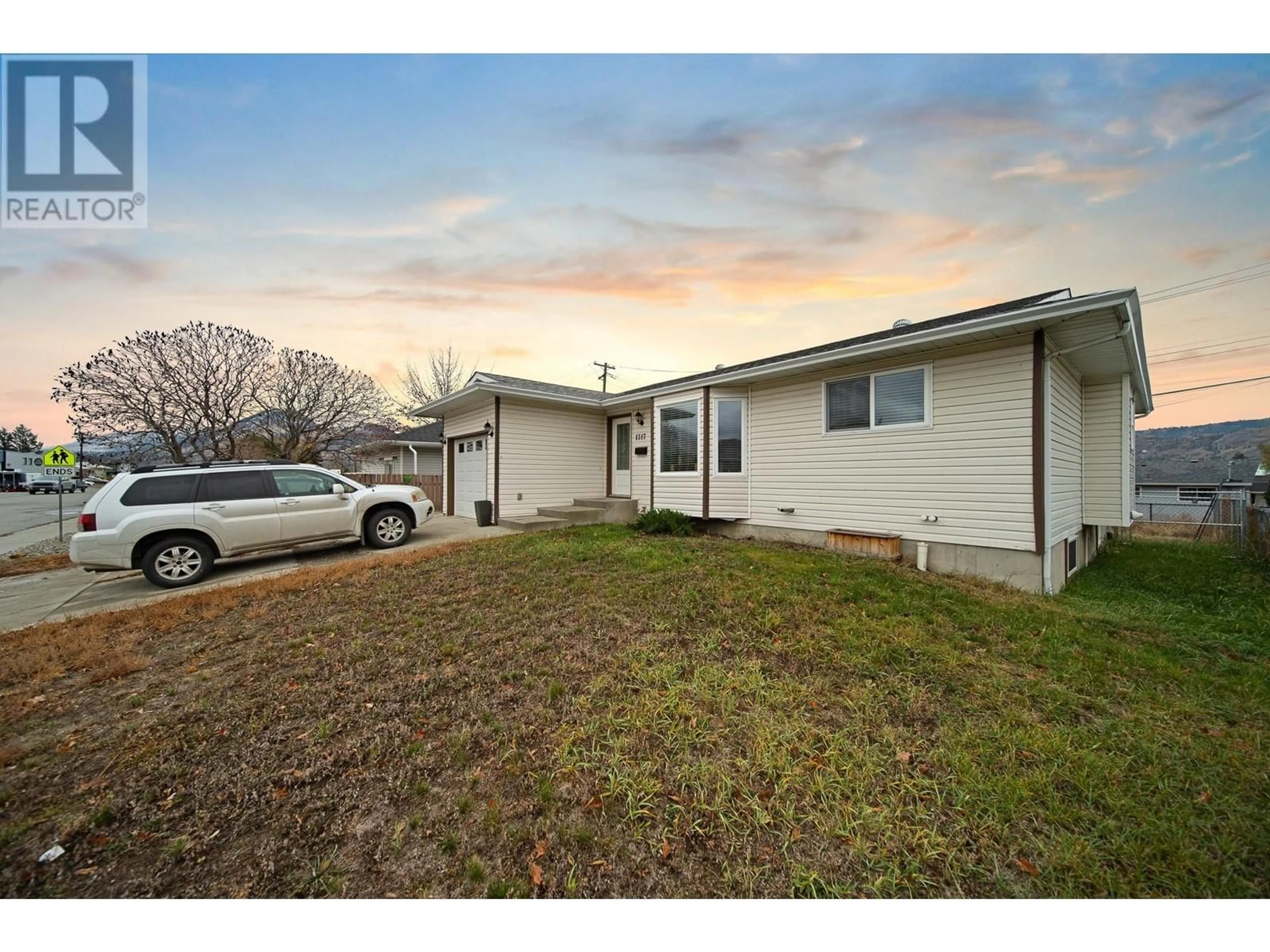 A pic from exterior of the house or condo, the fenced backyard for 1317 Lethbridge Avenue Avenue, Kamloops British Columbia V2B8K6