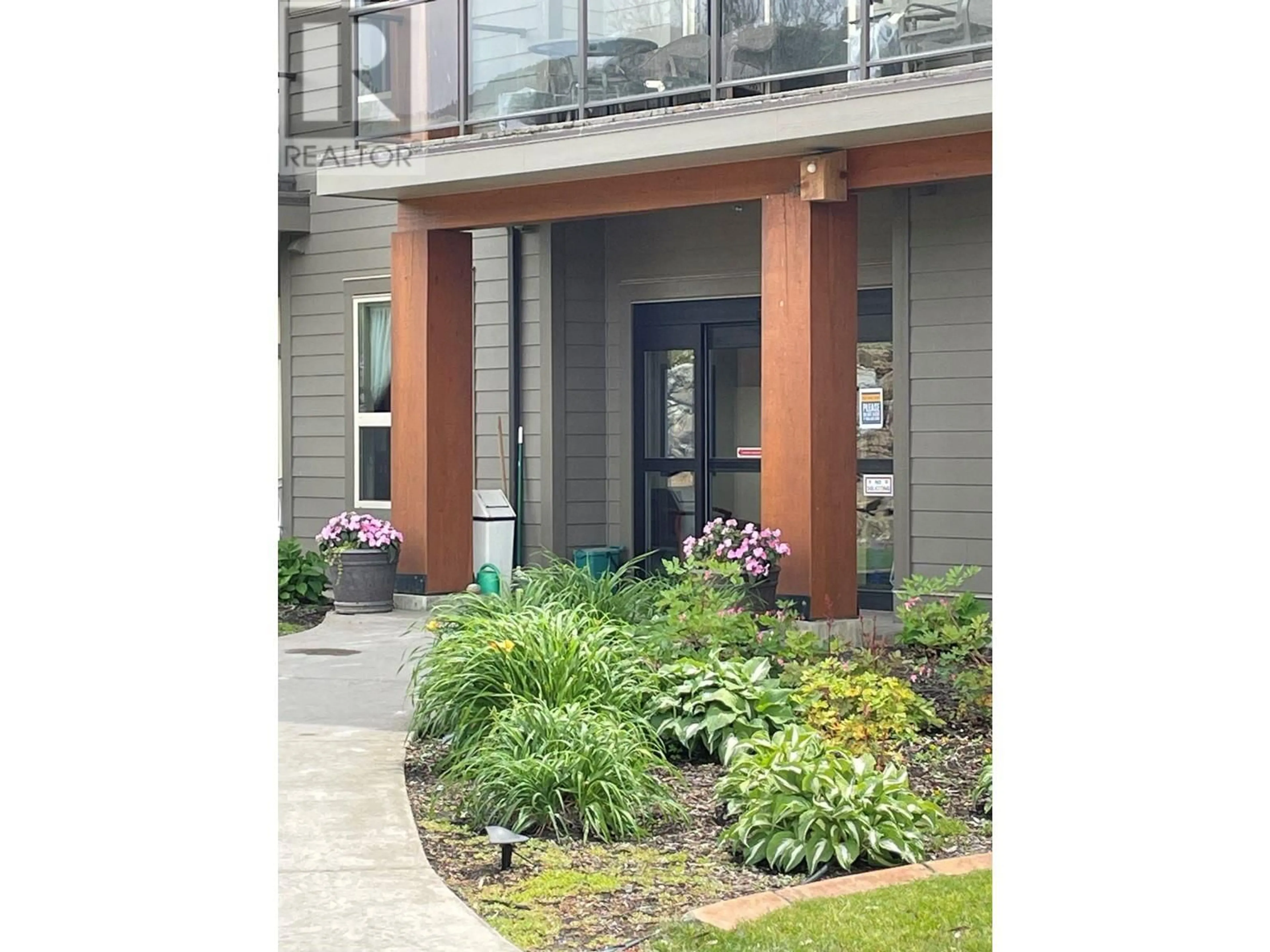 A pic from exterior of the house or condo, the street view for 9100 Mackie Drive Unit# 210, Coldstream British Columbia V1B1G9