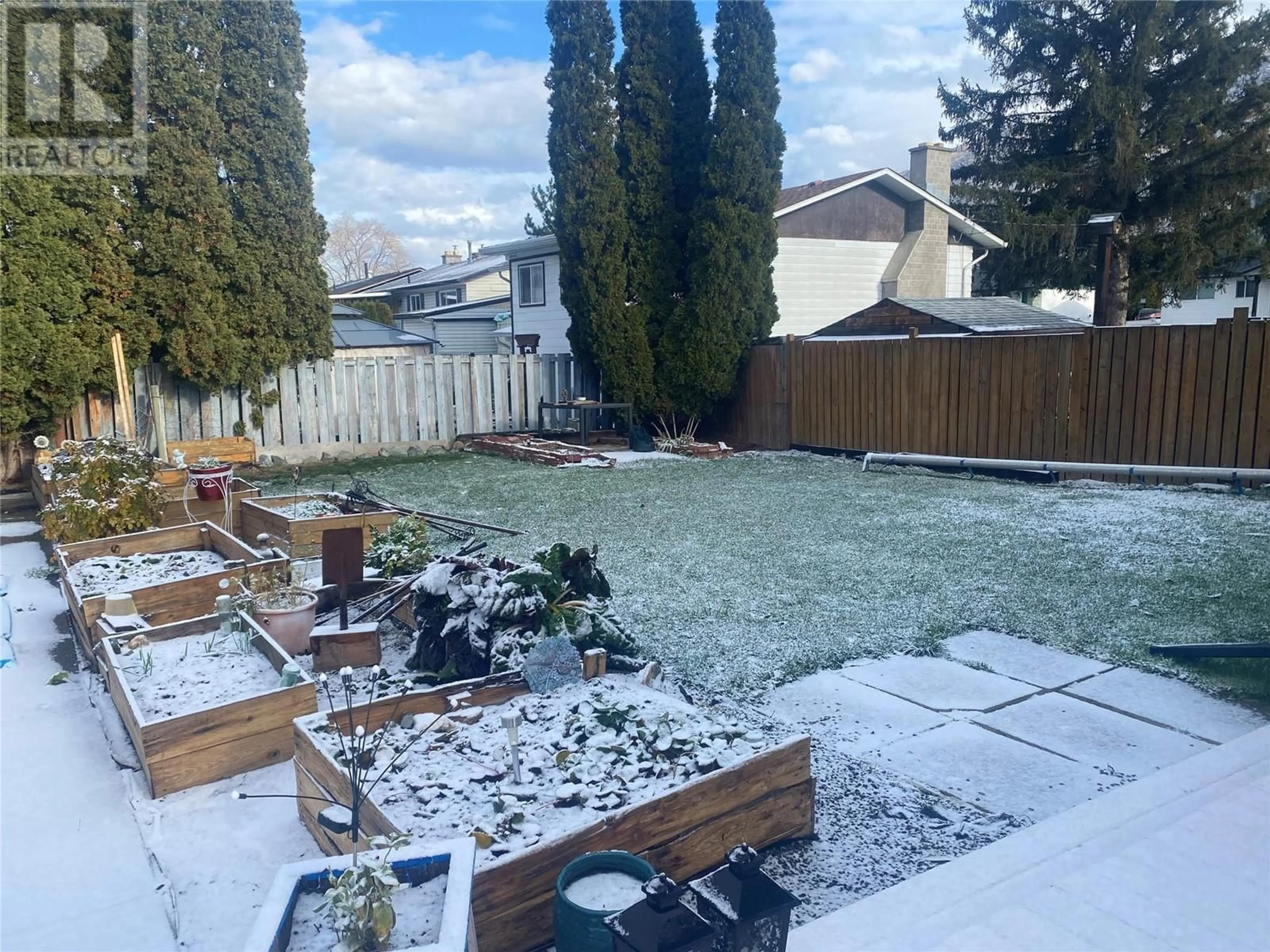 Patio, the fenced backyard for 378 Reighmount Drive, Kamloops British Columbia V2H1M2