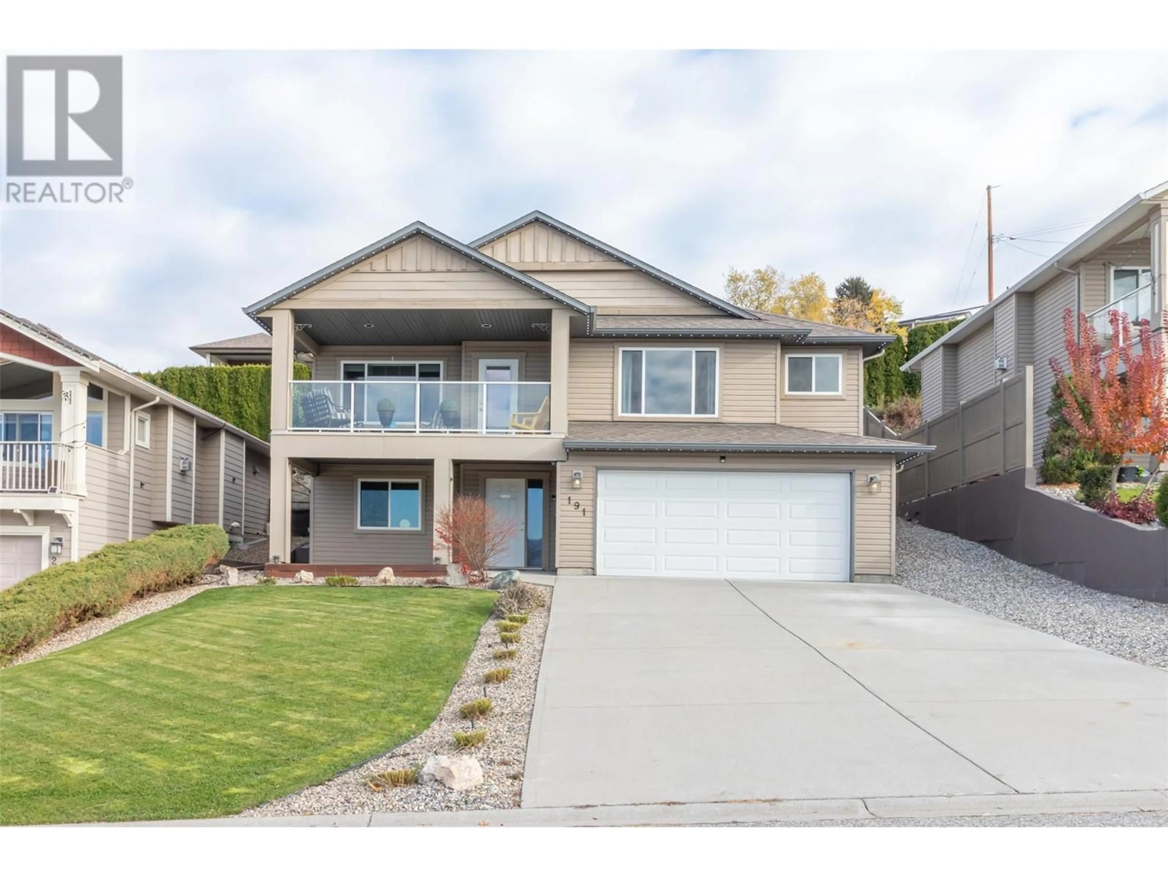 Frontside or backside of a home, the street view for 191 Poonian Court, Kelowna British Columbia V1X7Y9