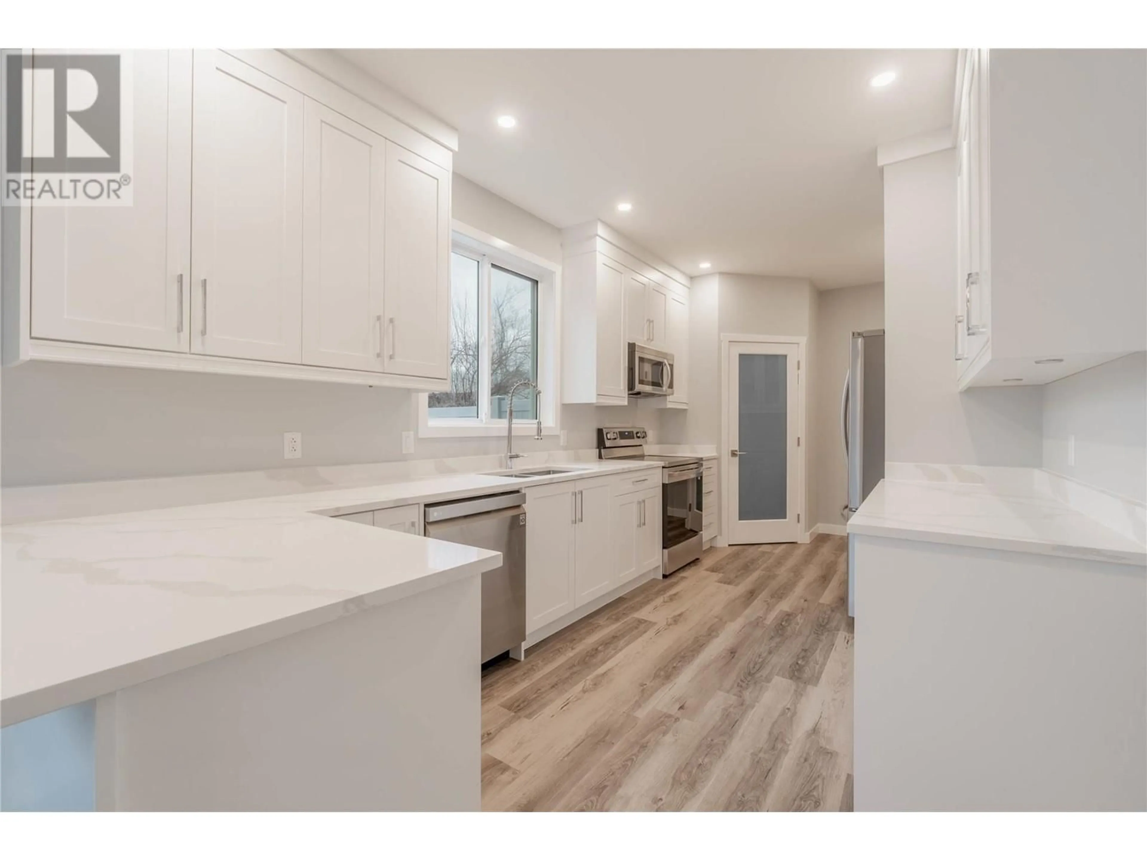 Open concept kitchen for 5830 OKANAGAN Street Unit# 103, Oliver British Columbia V0H1T9