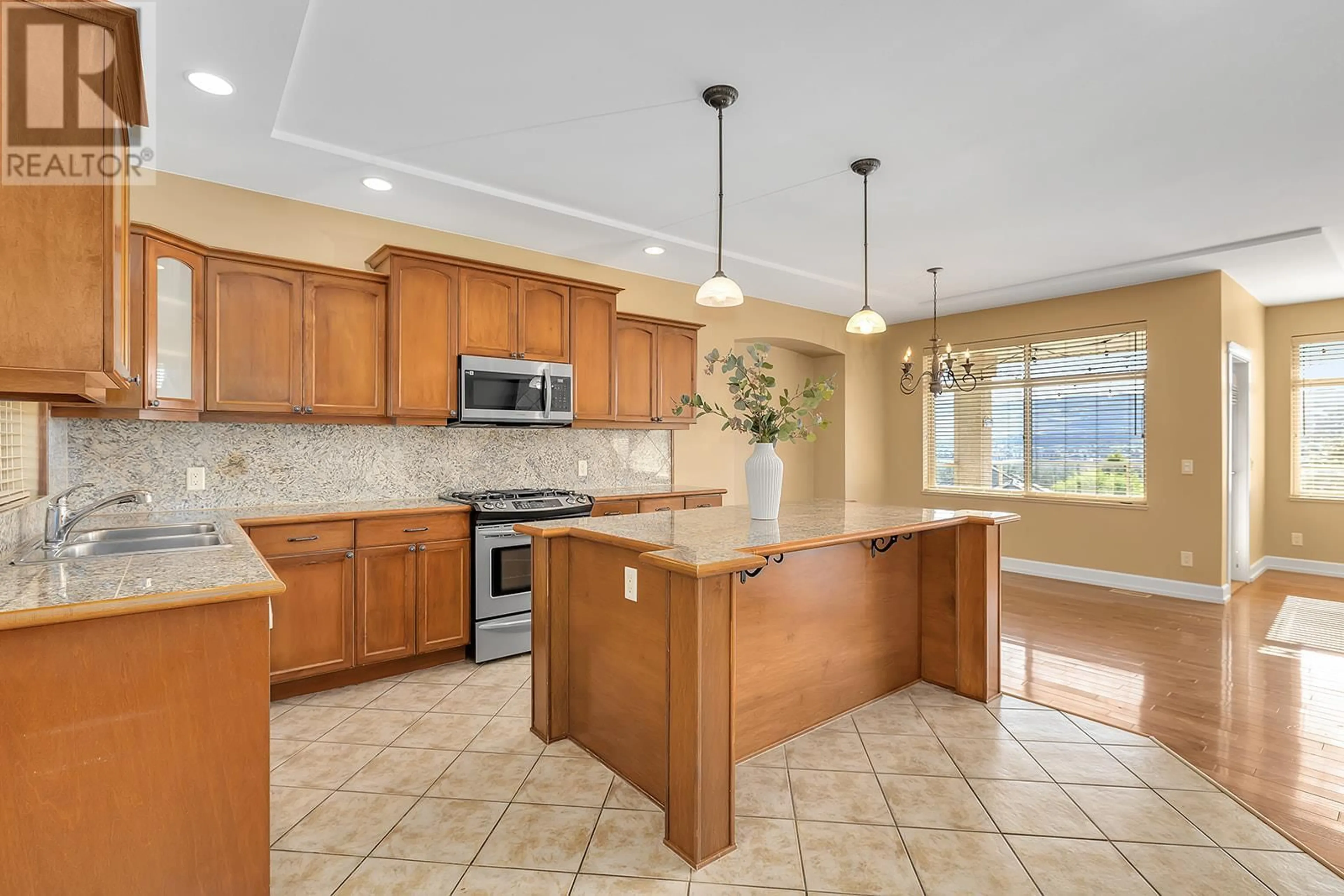 Open concept kitchen for 1592 Merlot Drive, West Kelowna British Columbia V4T2X7