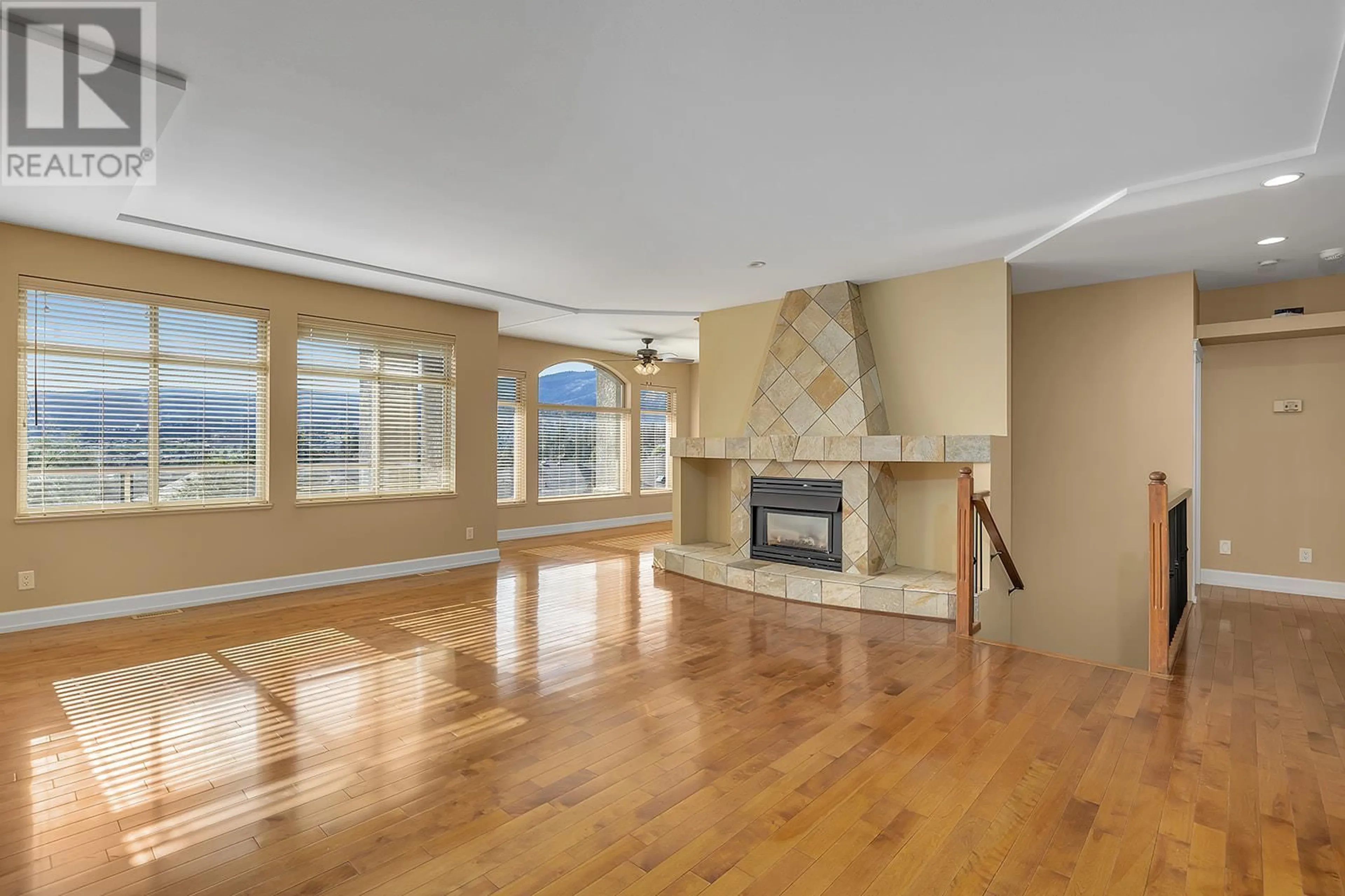 Living room, wood floors for 1592 Merlot Drive, West Kelowna British Columbia V4T2X7