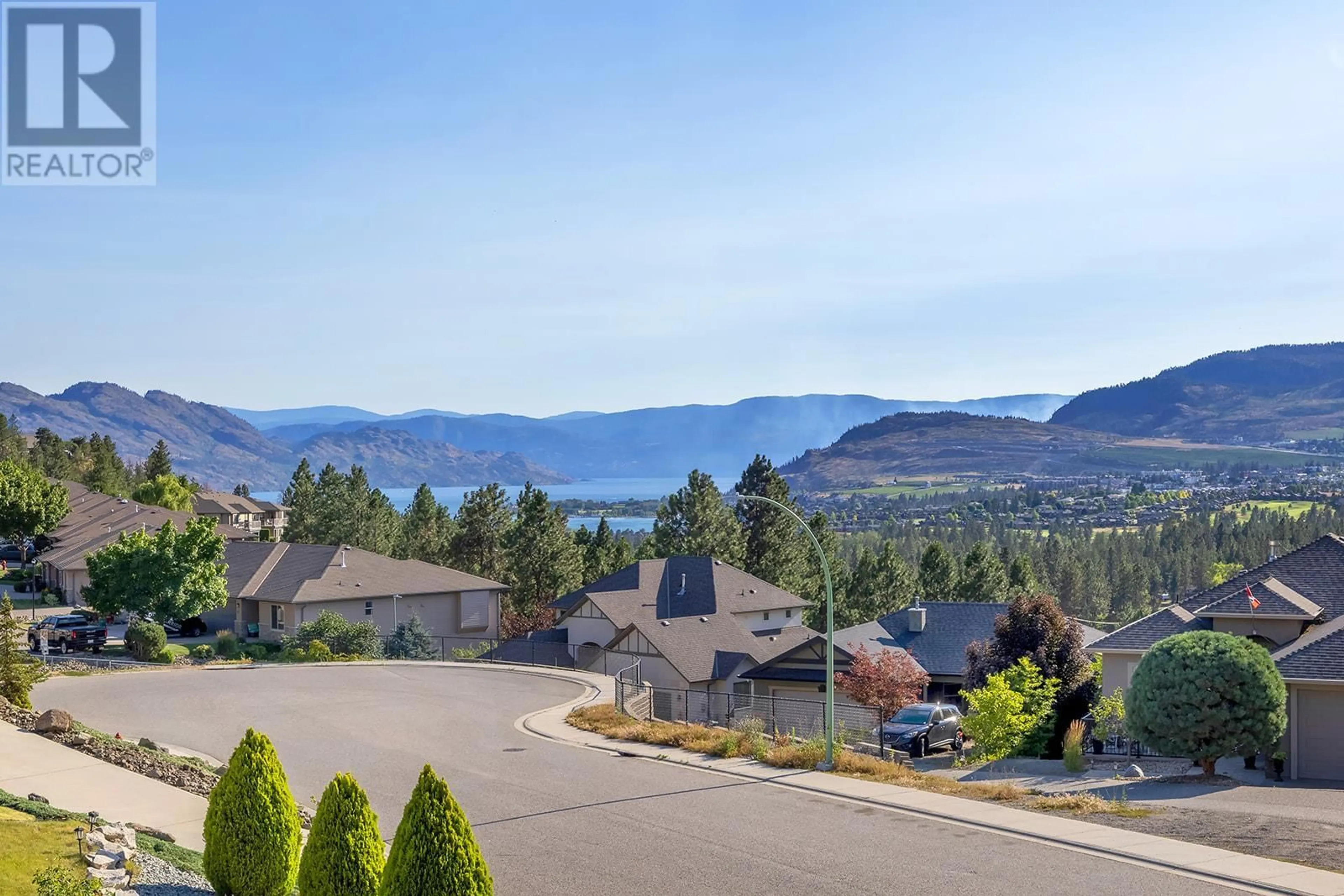 A pic from exterior of the house or condo, the view of mountain for 1592 Merlot Drive, West Kelowna British Columbia V4T2X7