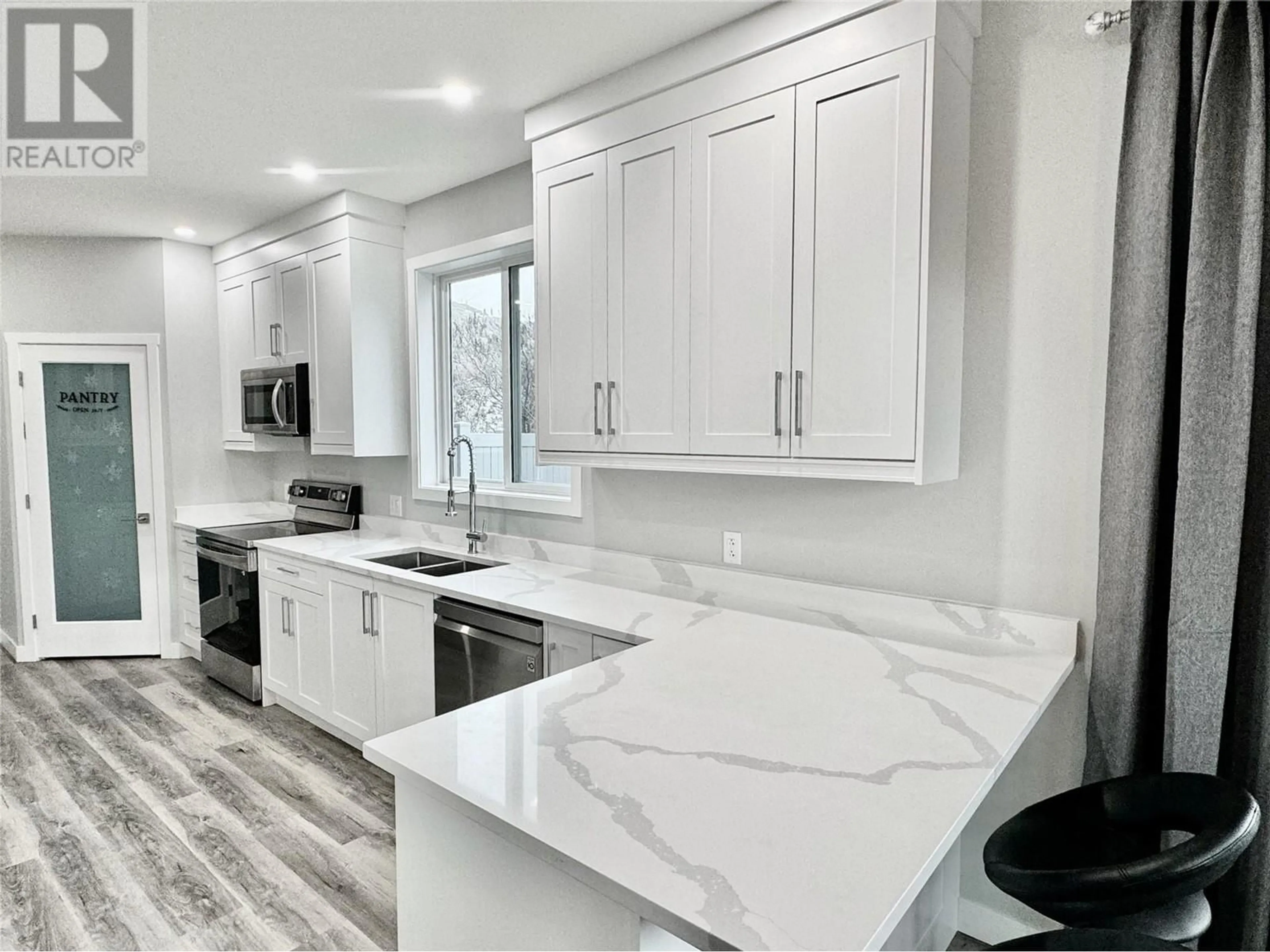 Contemporary kitchen, ceramic floors, mountain for 5830 OKANAGAN Street Unit# 102, Oliver British Columbia V0H1T9