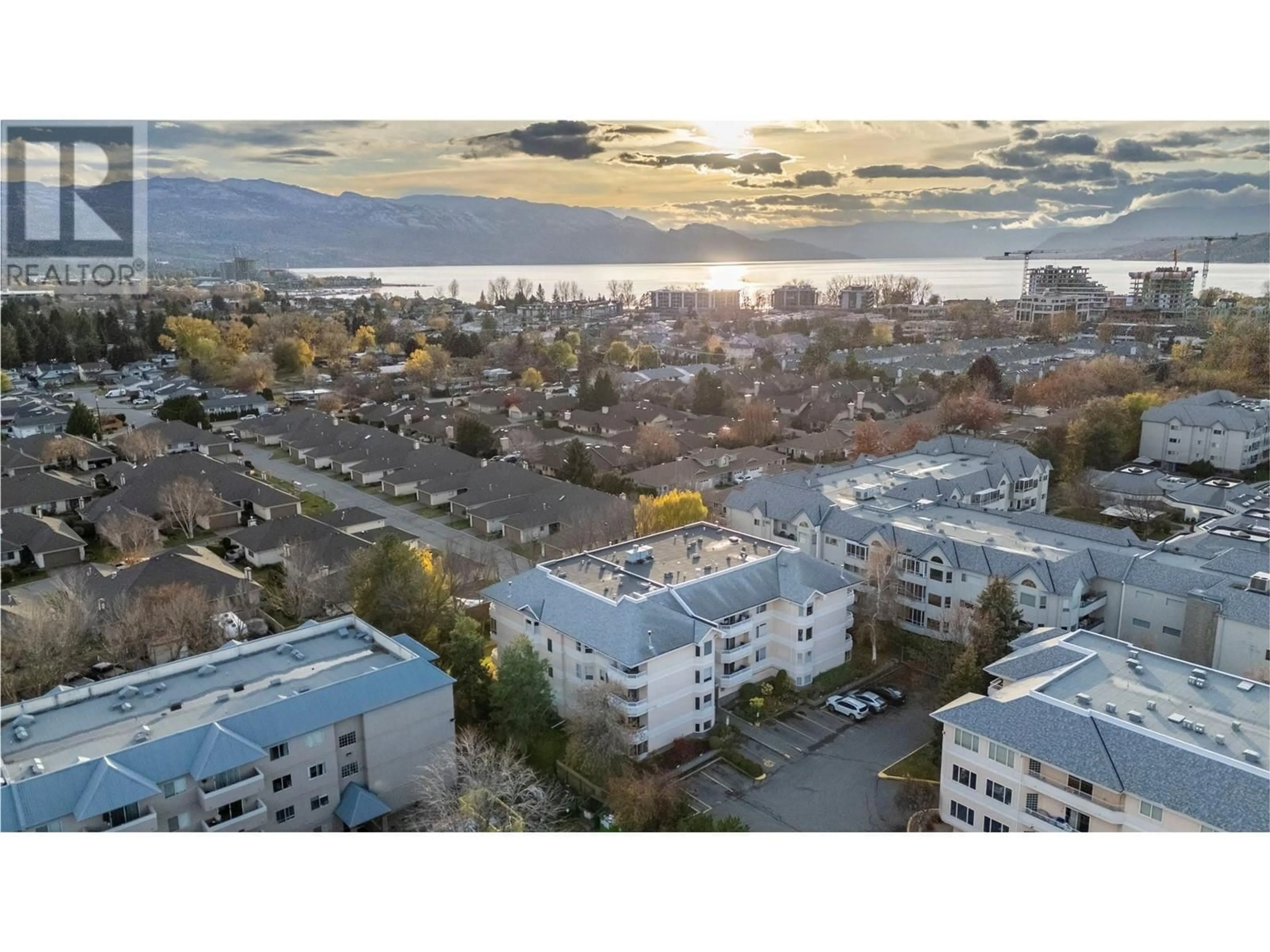 A pic from exterior of the house or condo, the street view for 987 KLO Road Unit# 103, Kelowna British Columbia V1Y9L2