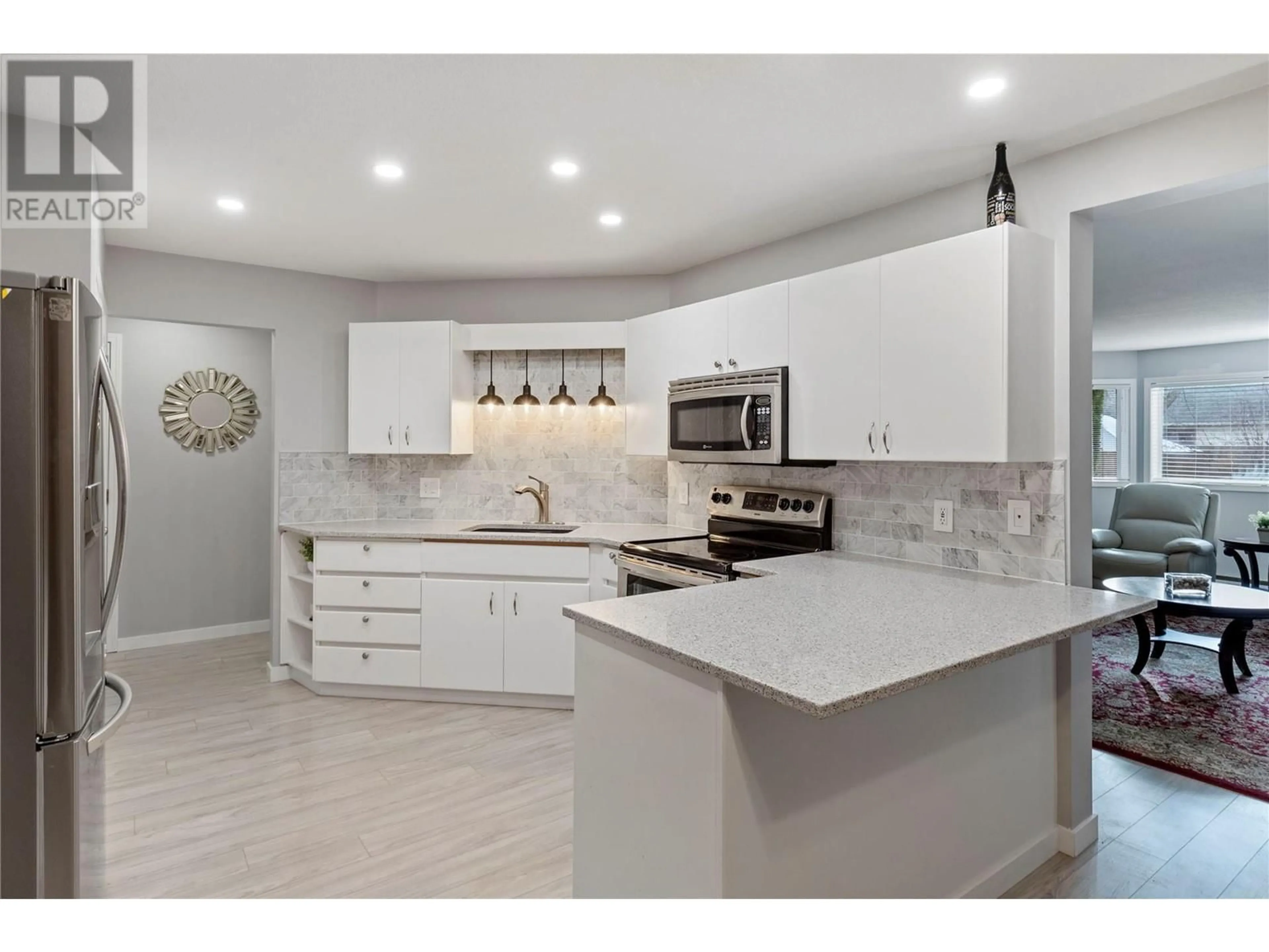 Open concept kitchen for 987 KLO Road Unit# 103, Kelowna British Columbia V1Y9L2