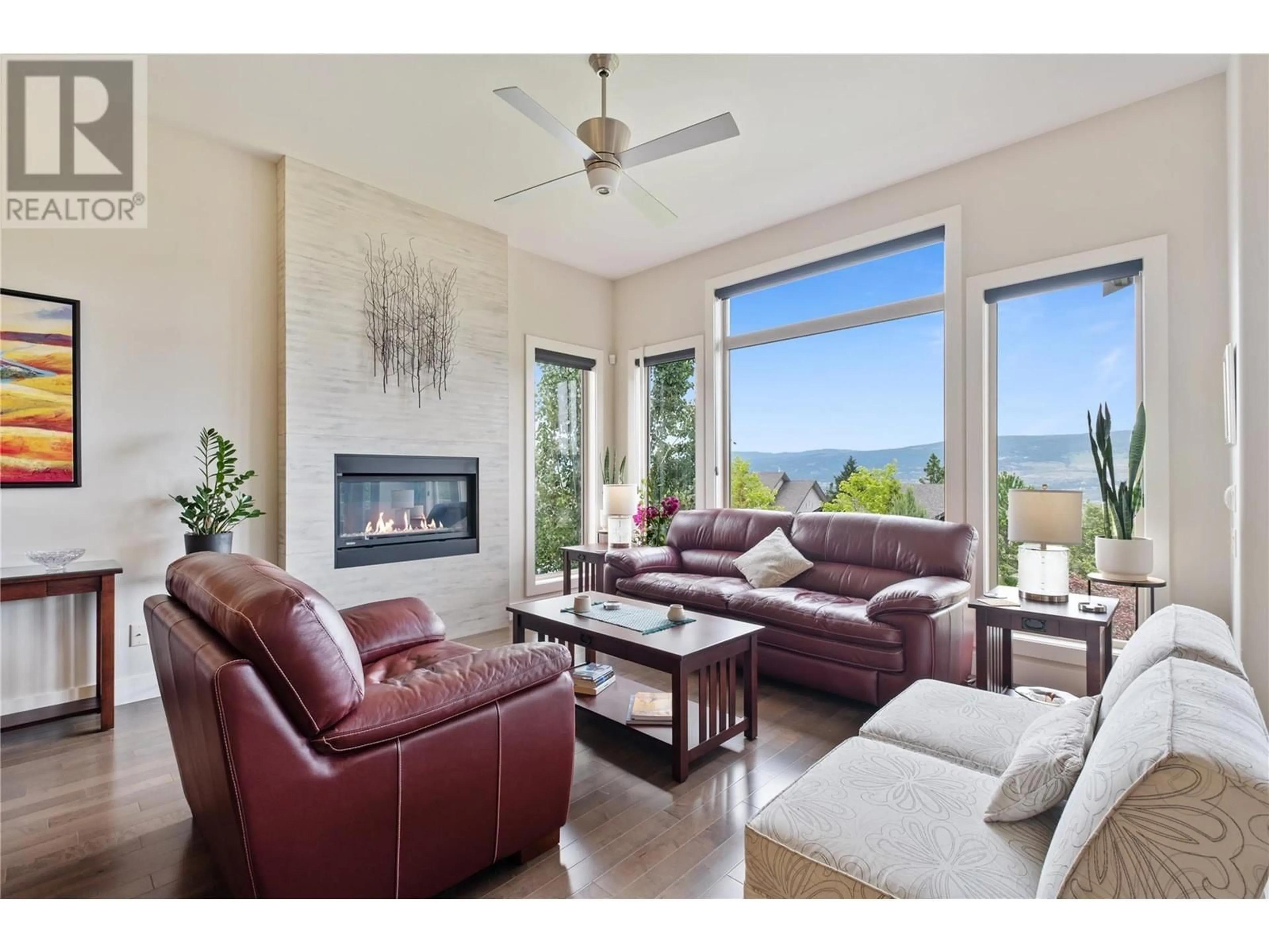 Living room, wood floors for 569 Harrogate Lane, Kelowna British Columbia V1V2V6