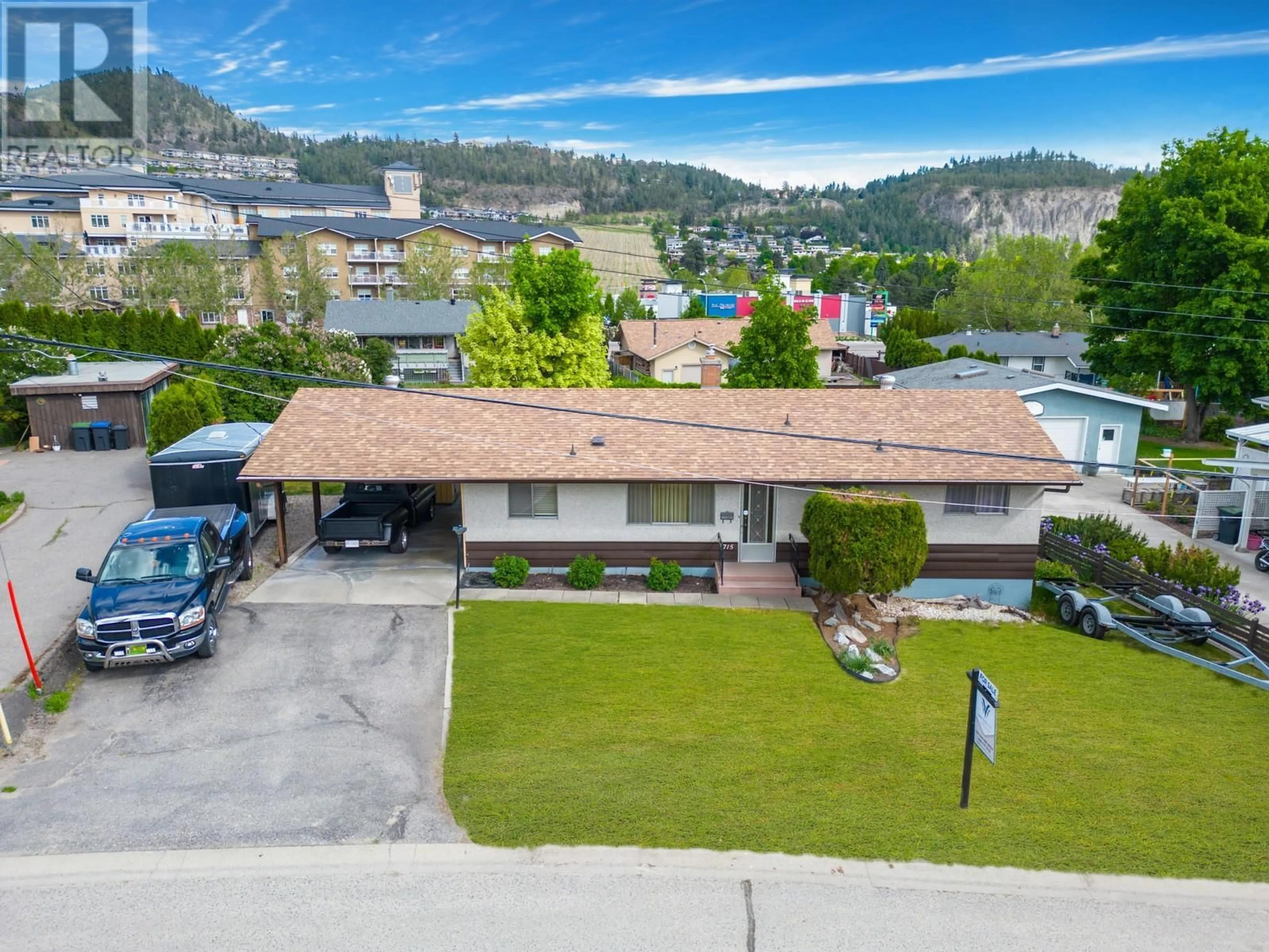 Frontside or backside of a home, the front or back of building for 715 Glenburn Street, Kelowna British Columbia V1Y4G4