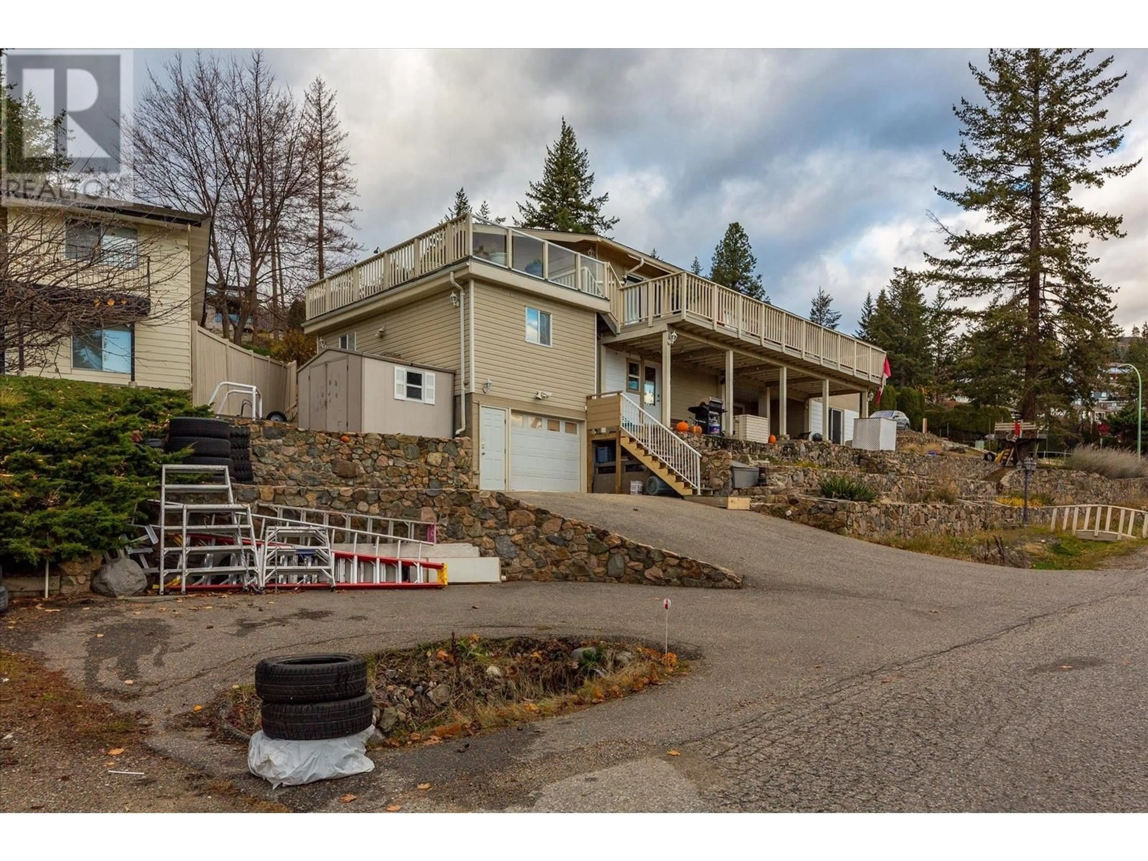 Frontside or backside of a home, the street view for 1572 Parkinson Road, West Kelowna British Columbia V1Z2X2