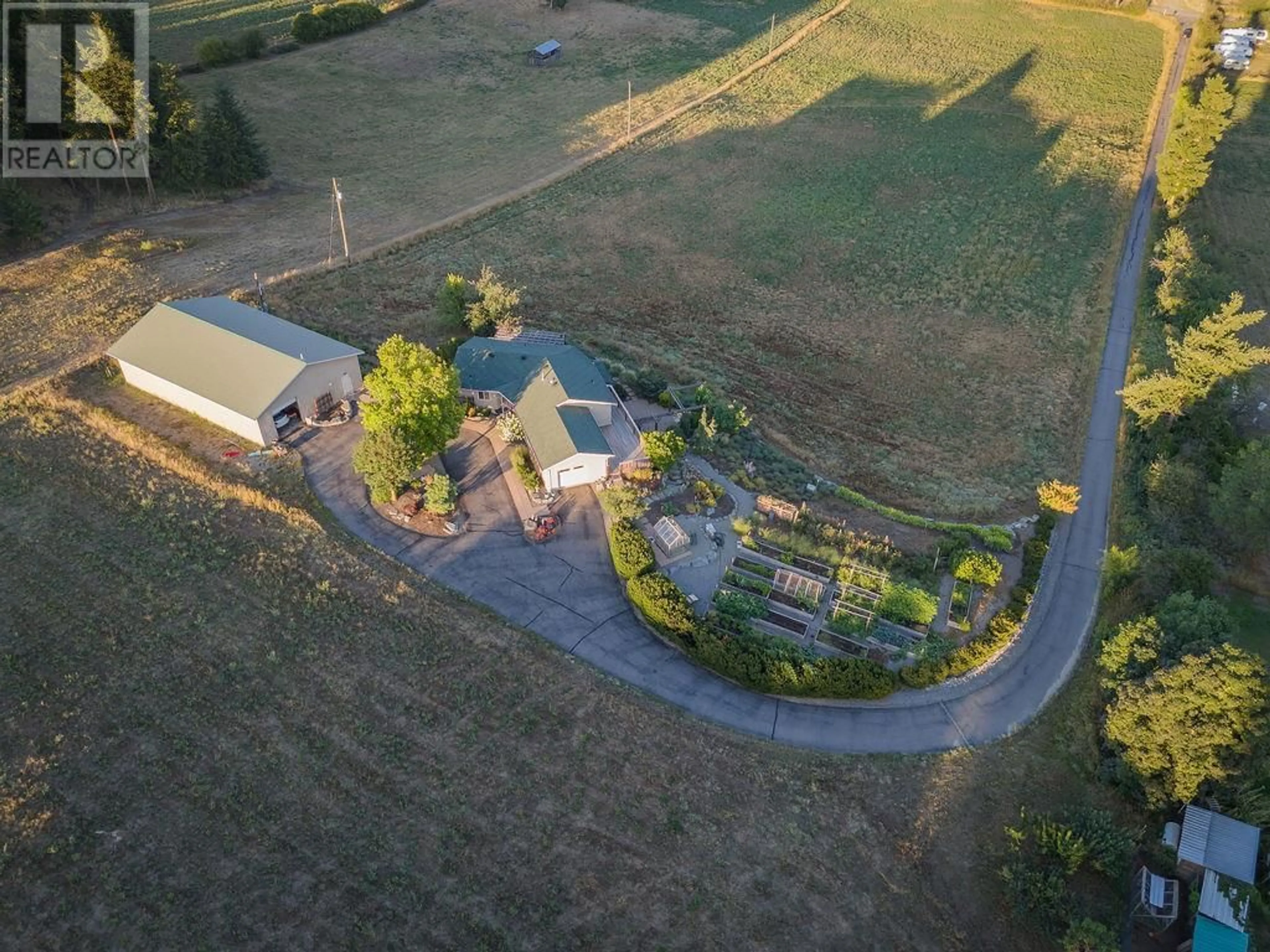 Patio, the fenced backyard for 4425 Schubert Road, Armstrong British Columbia V0E1B4