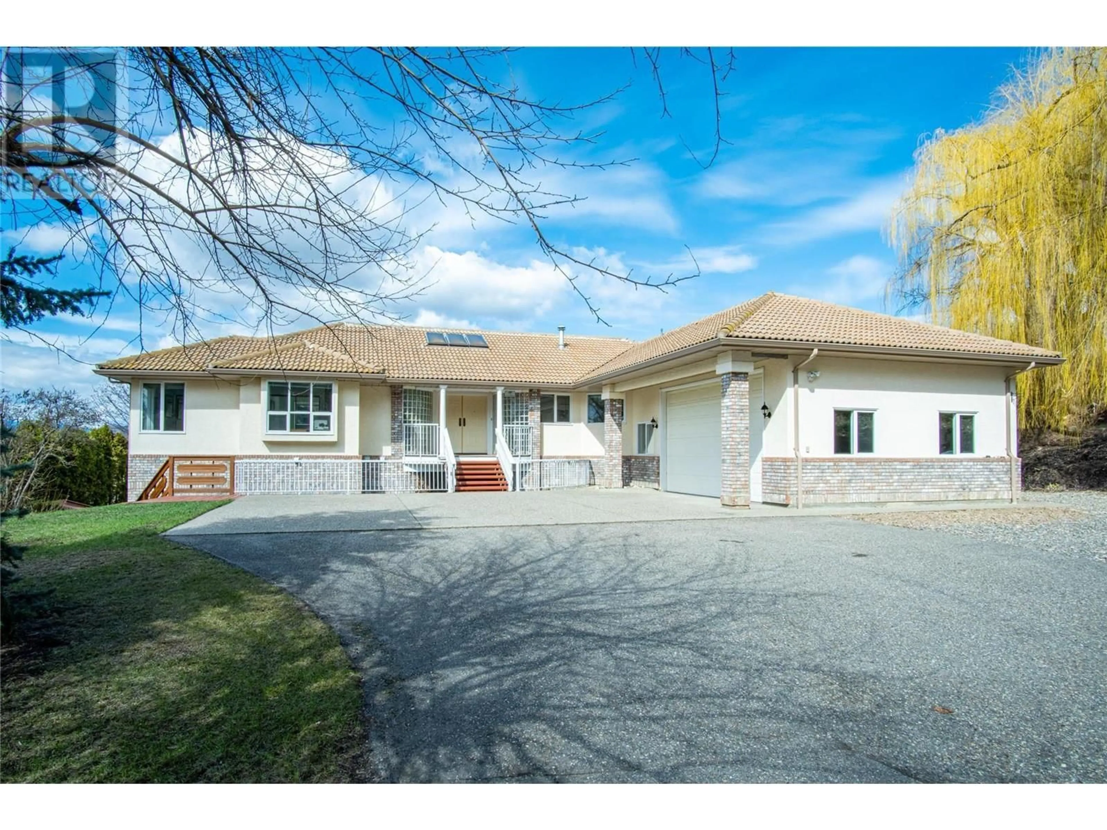 Frontside or backside of a home, the street view for 363 Northwind Drive, Vernon British Columbia V1H1X1