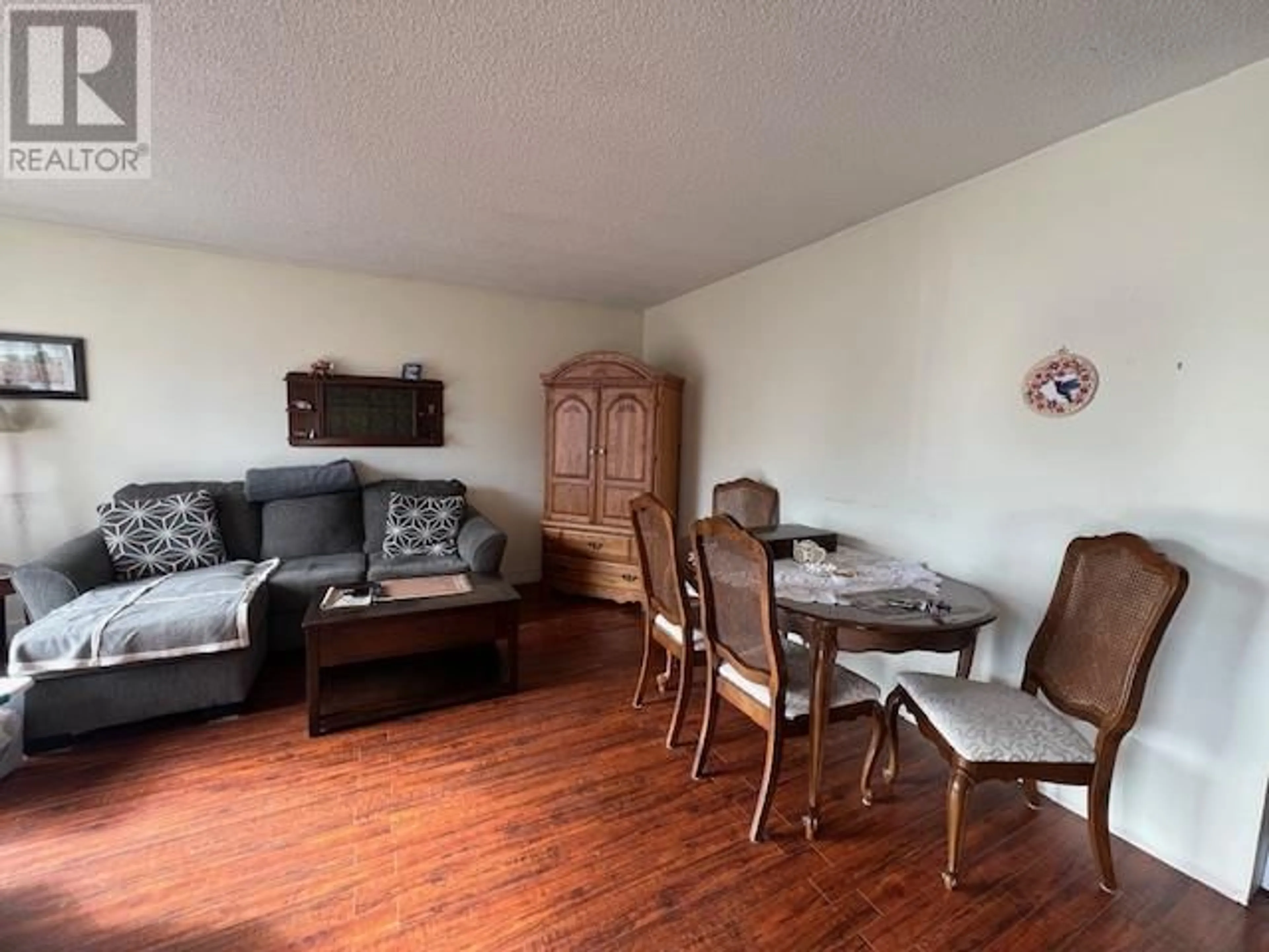 A pic of a room, wood floors for 8016 97th Street, Osoyoos British Columbia V0H1V2