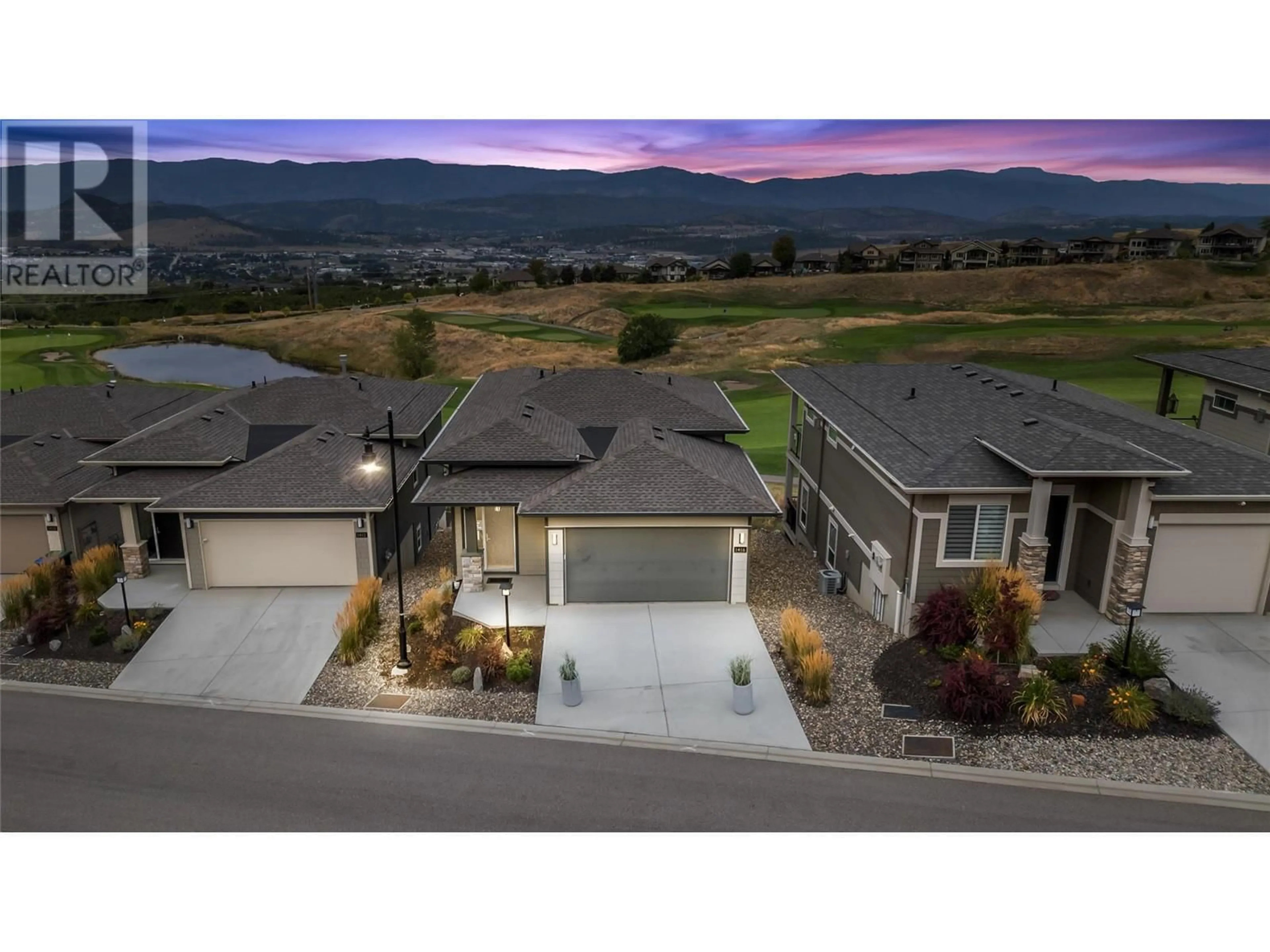 Frontside or backside of a home, the street view for 1416 Tower Ranch Drive, Kelowna British Columbia V1P1T8