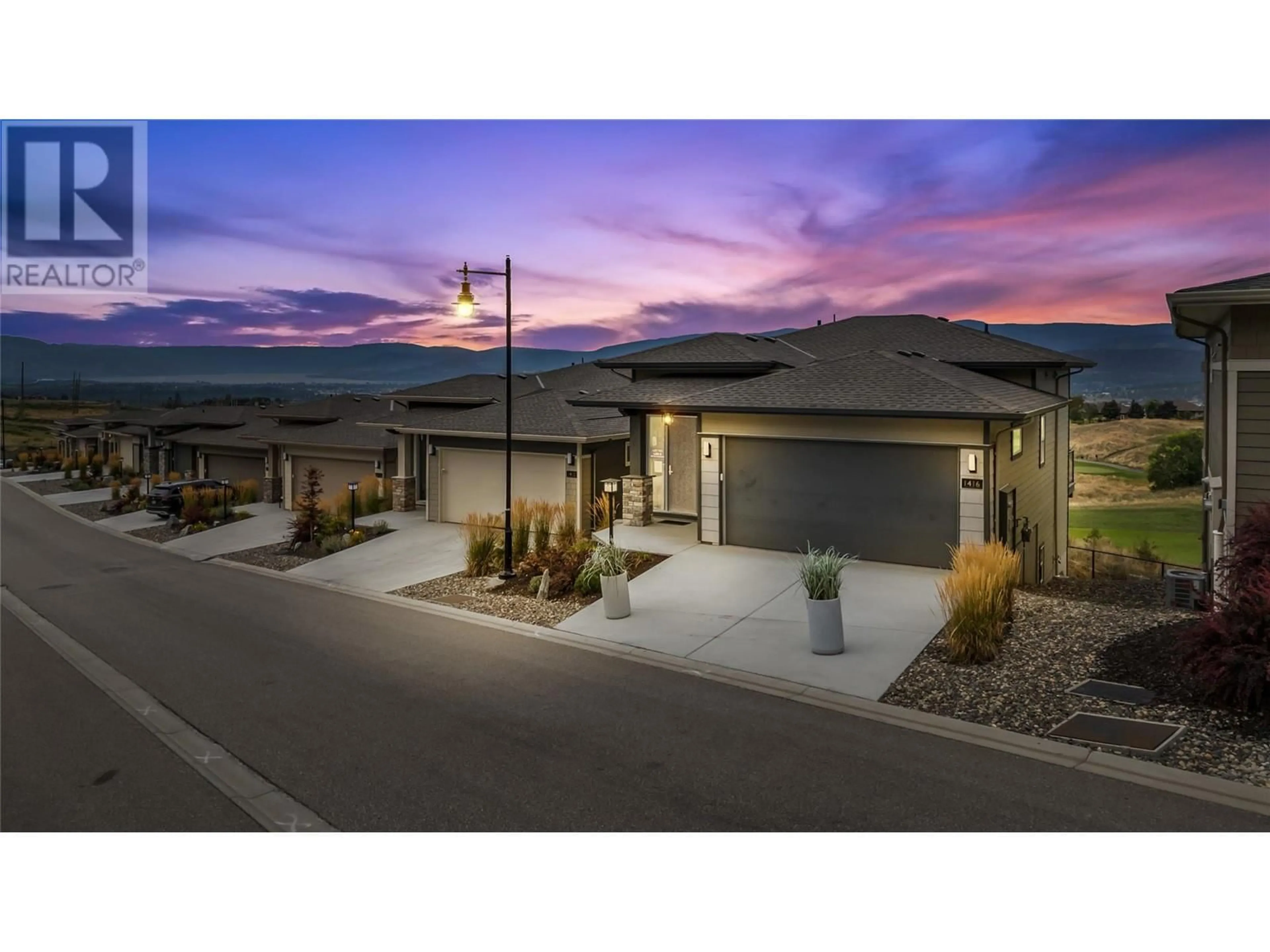 Frontside or backside of a home, the street view for 1416 Tower Ranch Drive, Kelowna British Columbia V1P1T8