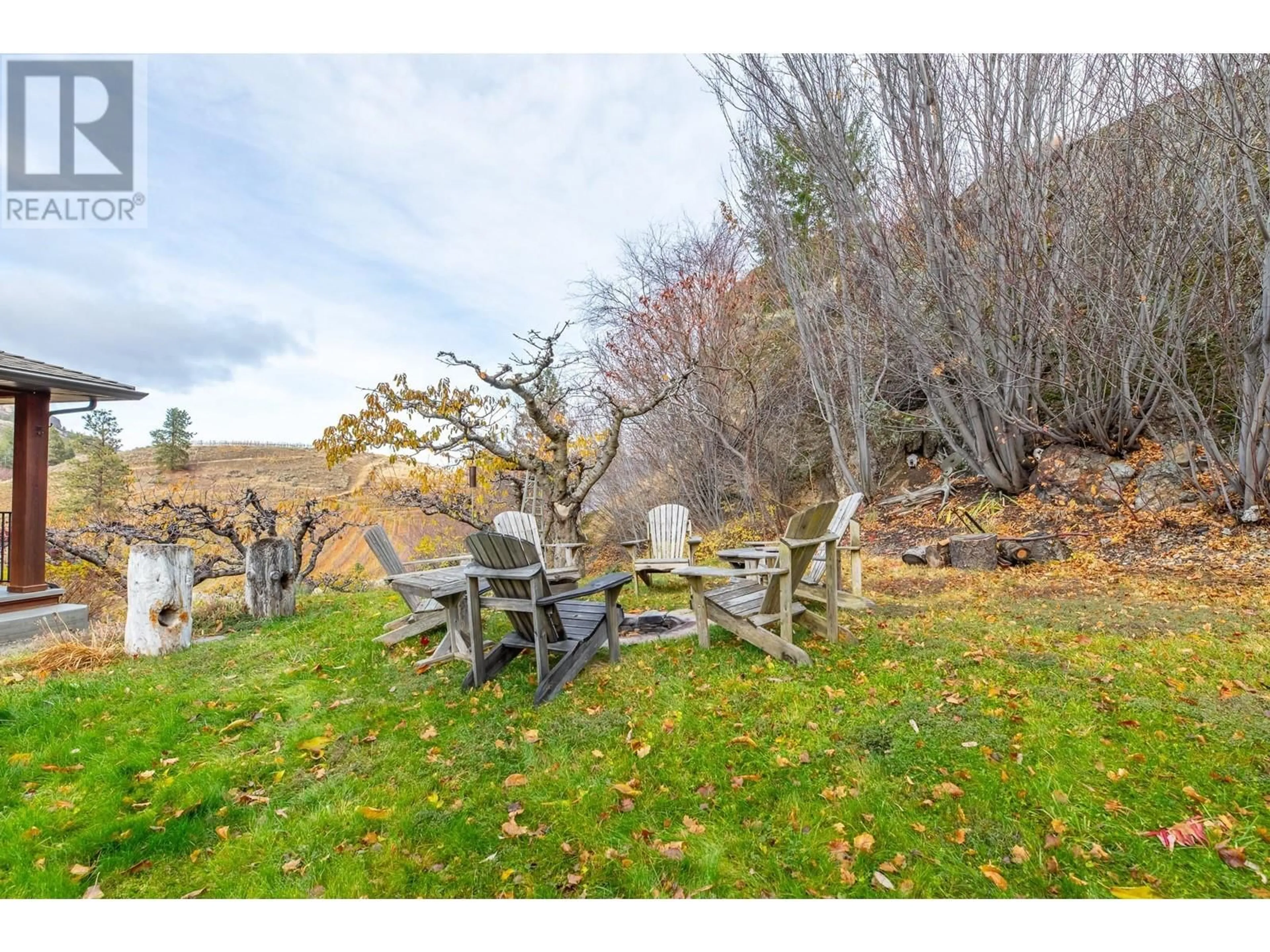 Patio, the fenced backyard for 19560 Matsu Drive, Summerland British Columbia V0H1Z6