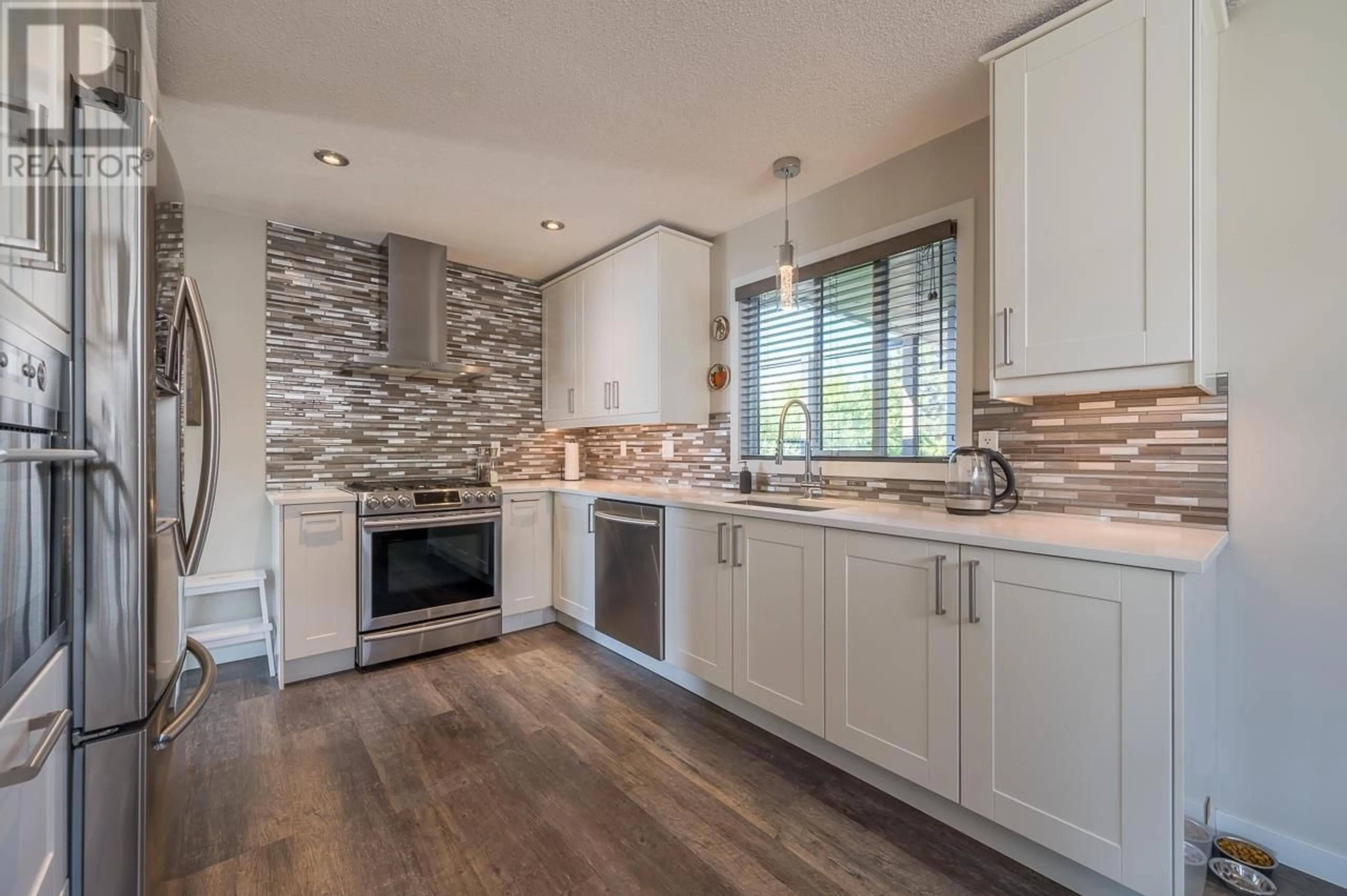 Contemporary kitchen, wood floors, cottage for 991 12th Street, Kamloops British Columbia V2B3C3