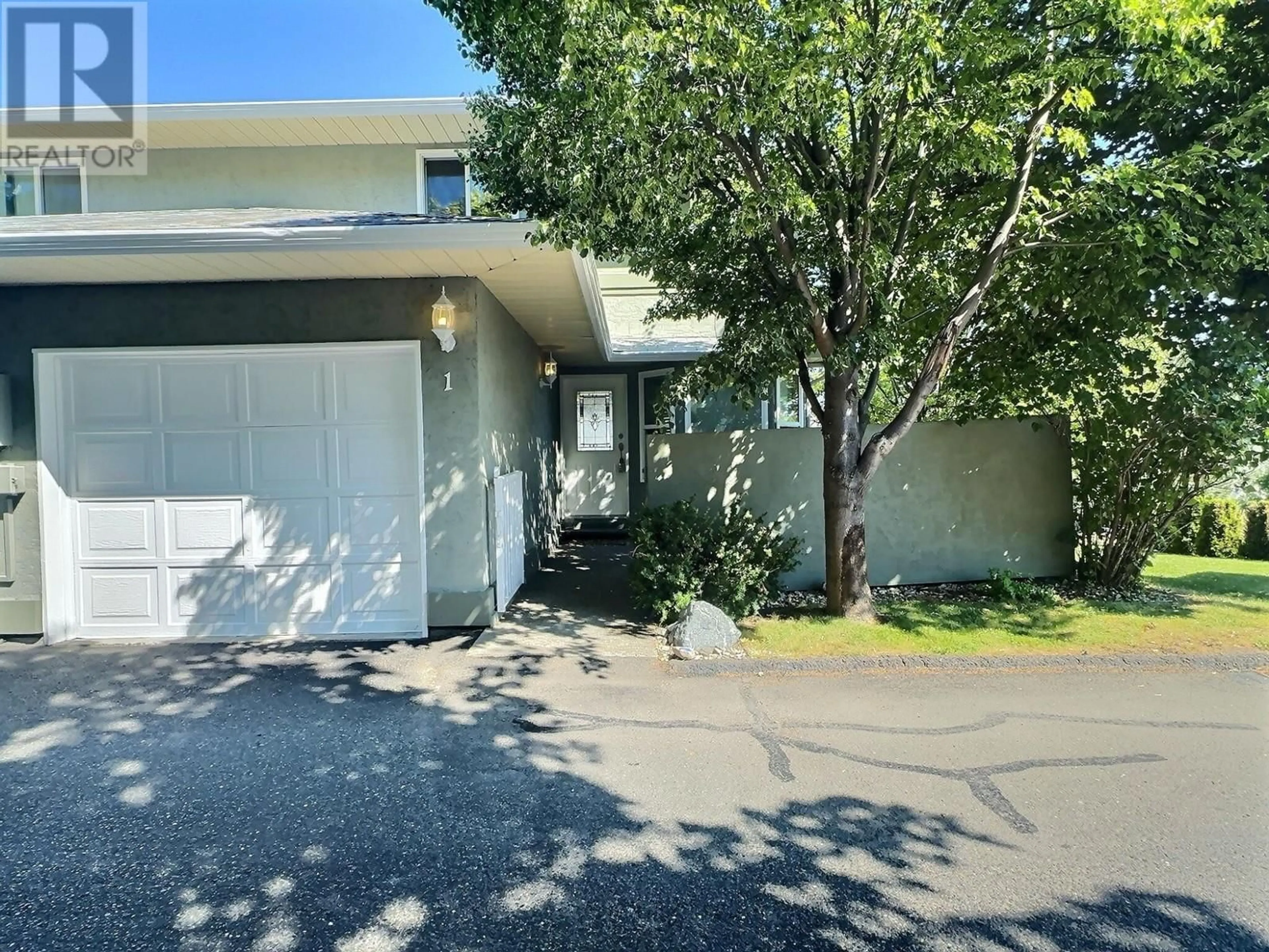 A pic from exterior of the house or condo, the street view for 2526 NECHAKO Drive Unit# 1, Kamloops British Columbia V2E2C9