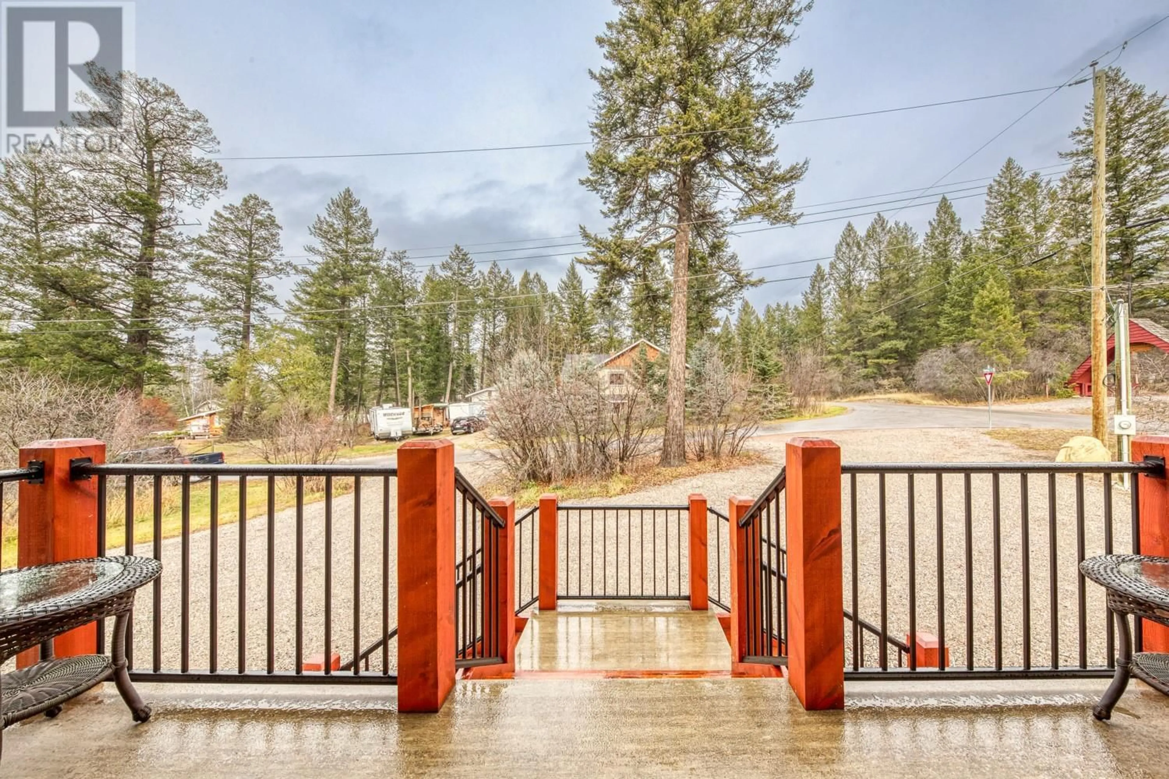 Patio, the fenced backyard for 4880 James Street, Fairmont Hot Springs British Columbia V0A1L1