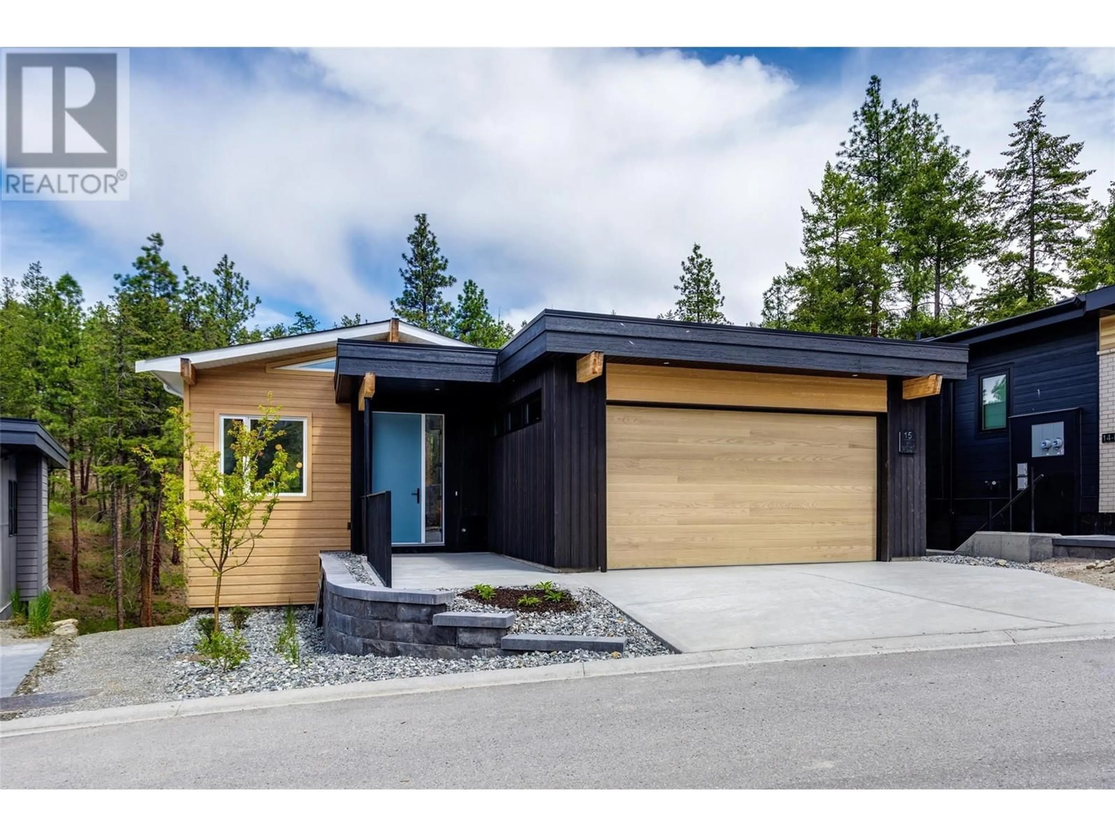 Frontside or backside of a home, cottage for 1960 Northern Flicker Court Unit# 15, Kelowna British Columbia V1V0G3