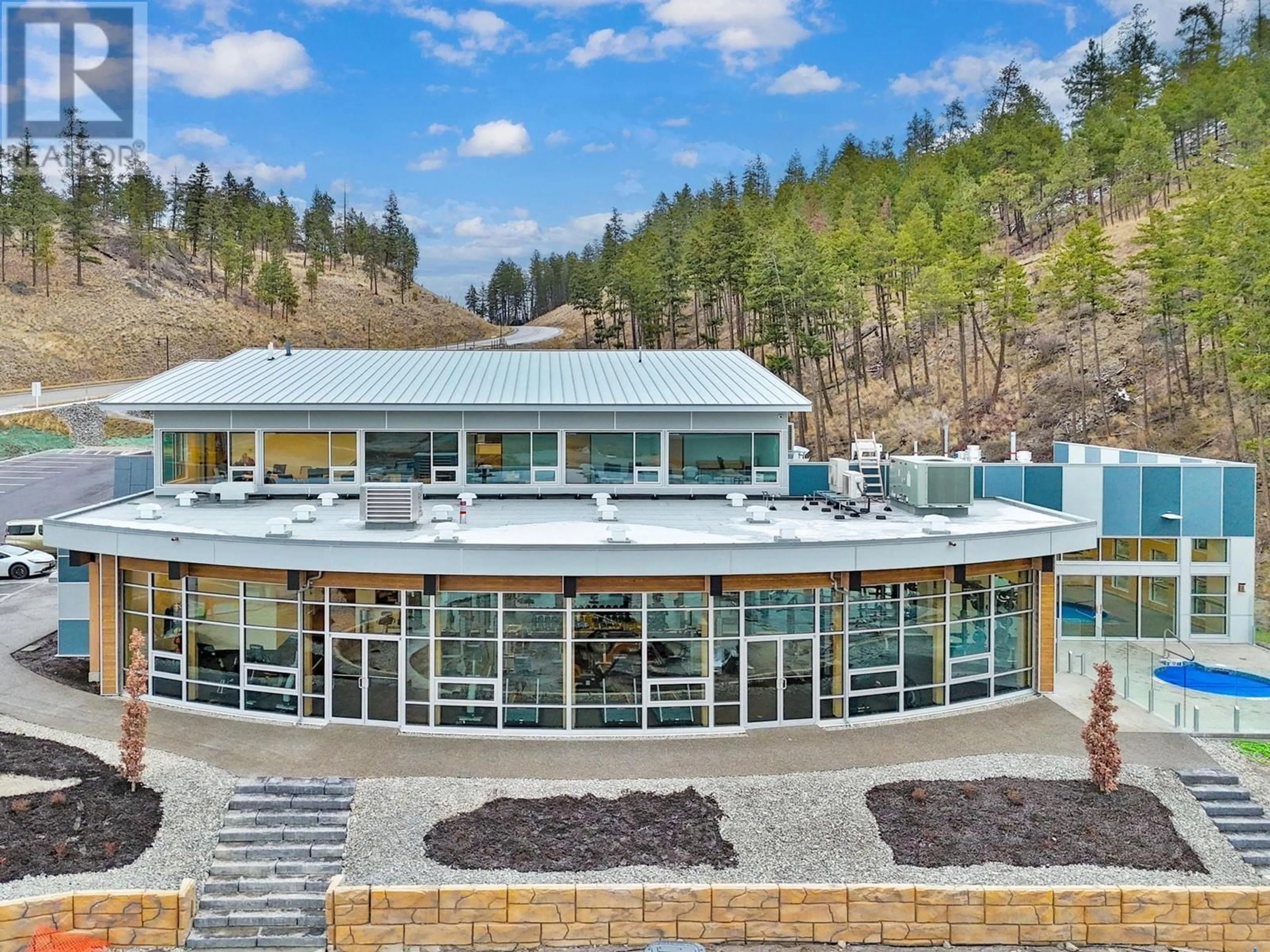 A pic from outside/outdoor area/front of a property/back of a property/a pic from drone, mountain view for 1960 Northern Flicker Court Unit# 15, Kelowna British Columbia V1V0G3