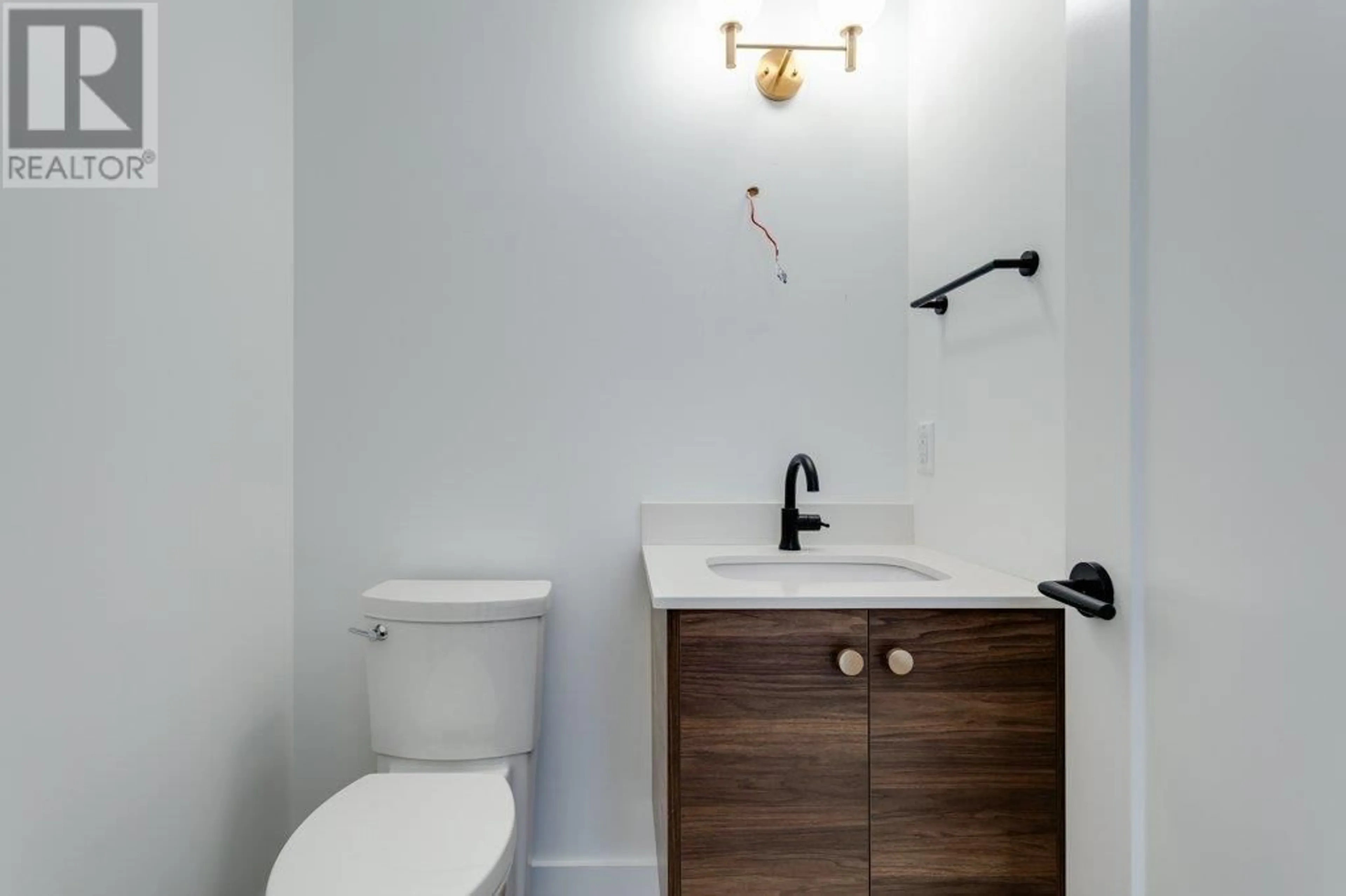 Standard bathroom, wood floors for 1960 Northern Flicker Court Unit# 15, Kelowna British Columbia V1V0G3