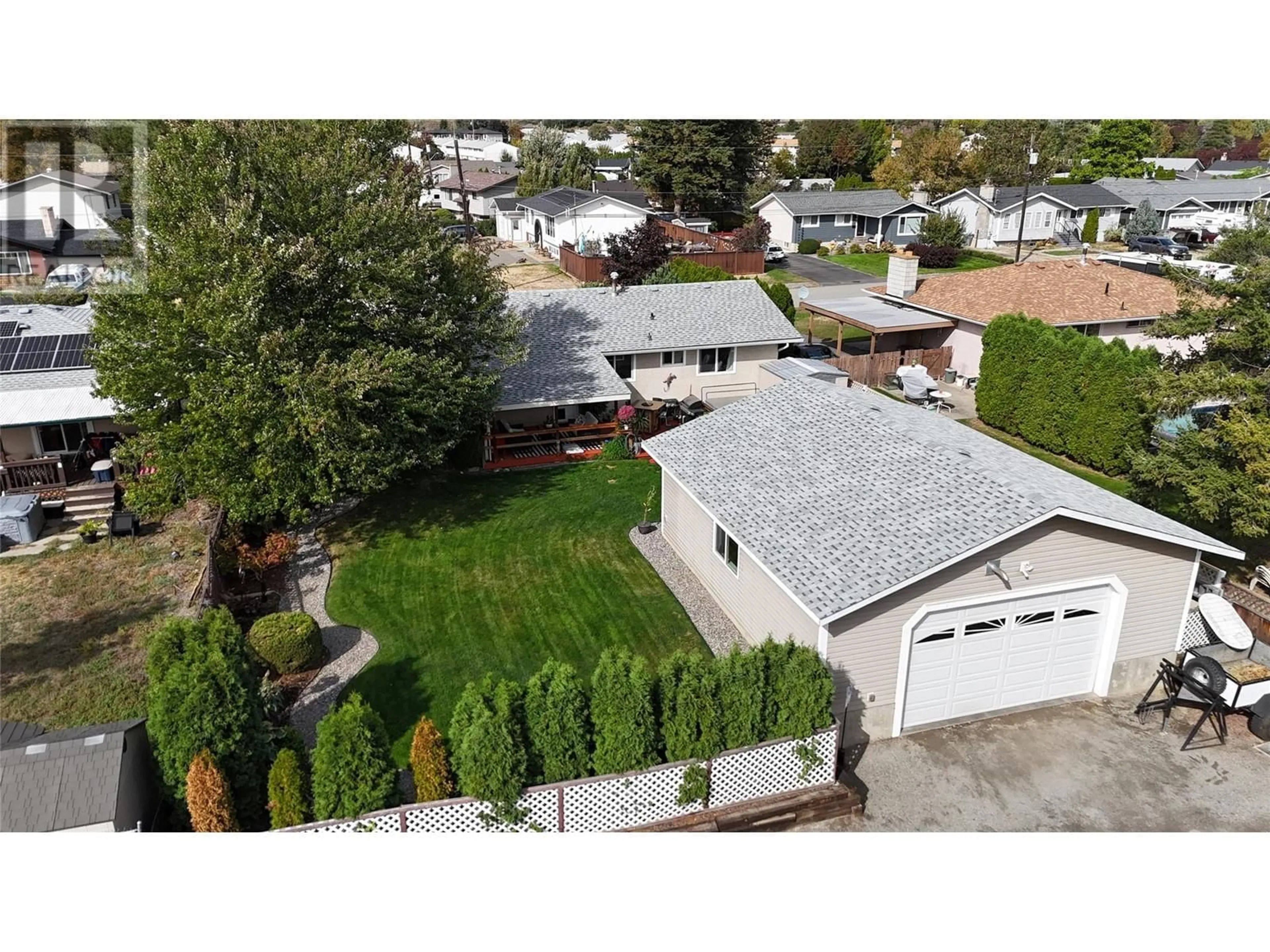 Frontside or backside of a home, the fenced backyard for 2579 TUPELA Drive, Kamloops British Columbia V2B6V8