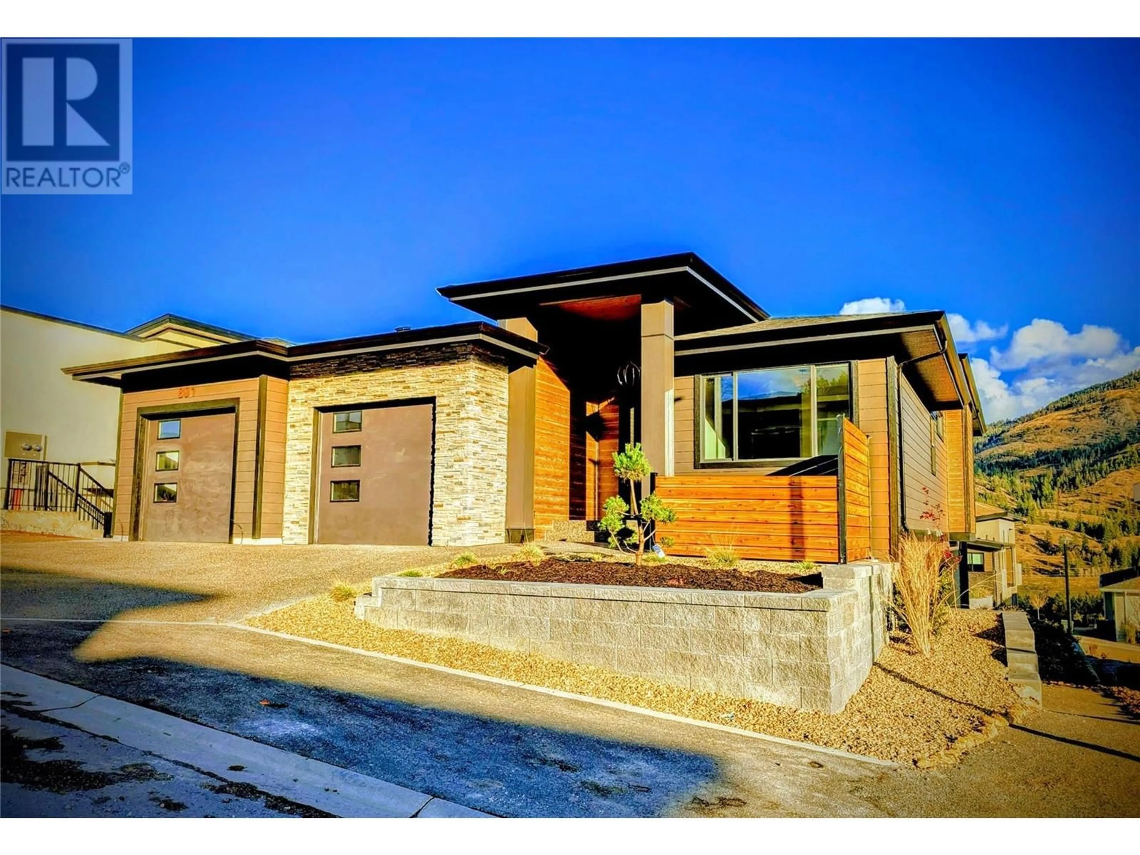 Frontside or backside of a home, mountain for 801 Melrose Street, Kelowna British Columbia V1P0A8