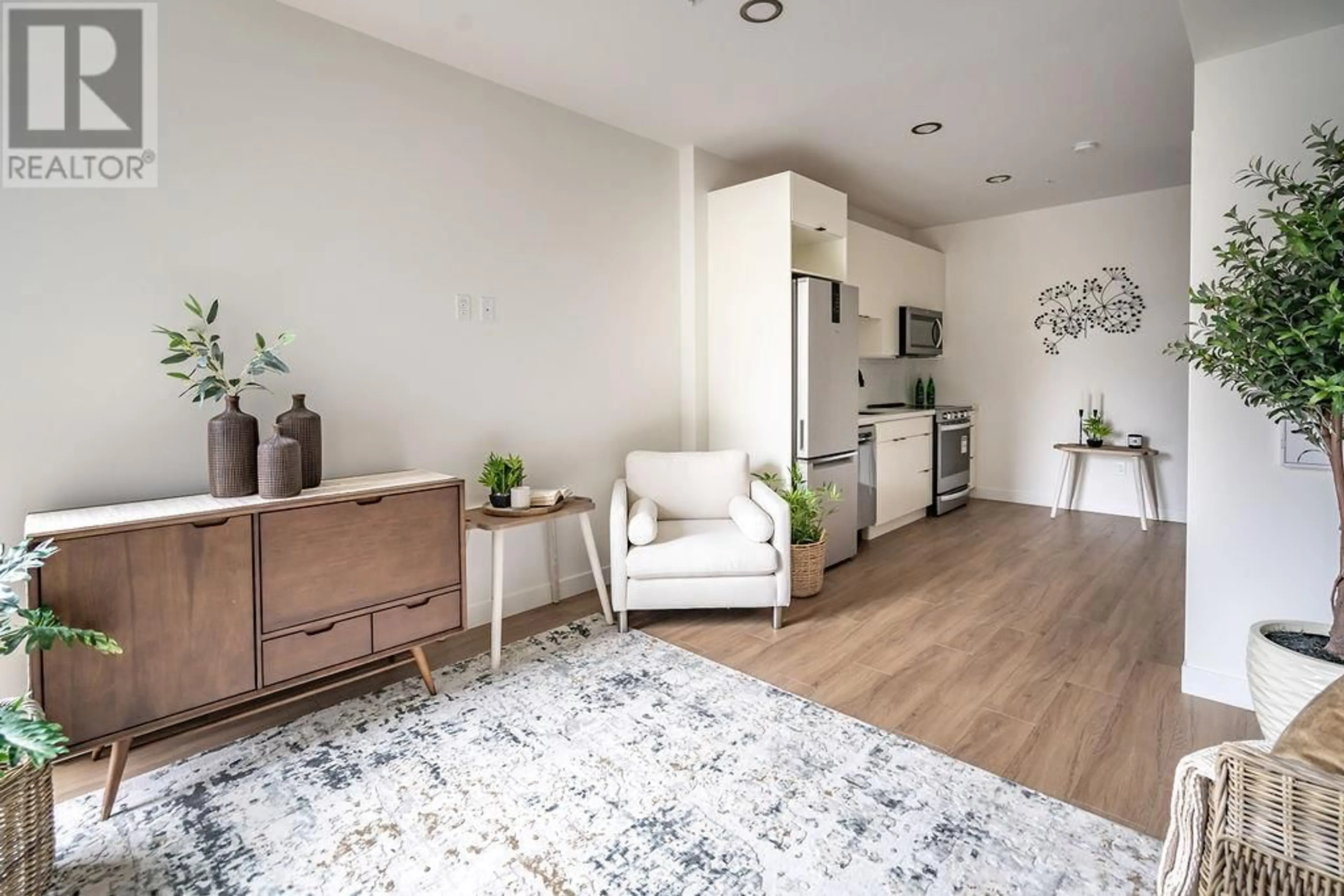 Living room, wood floors for 514 VICTORIA Street Unit# 209, Nelson British Columbia V1L4K8