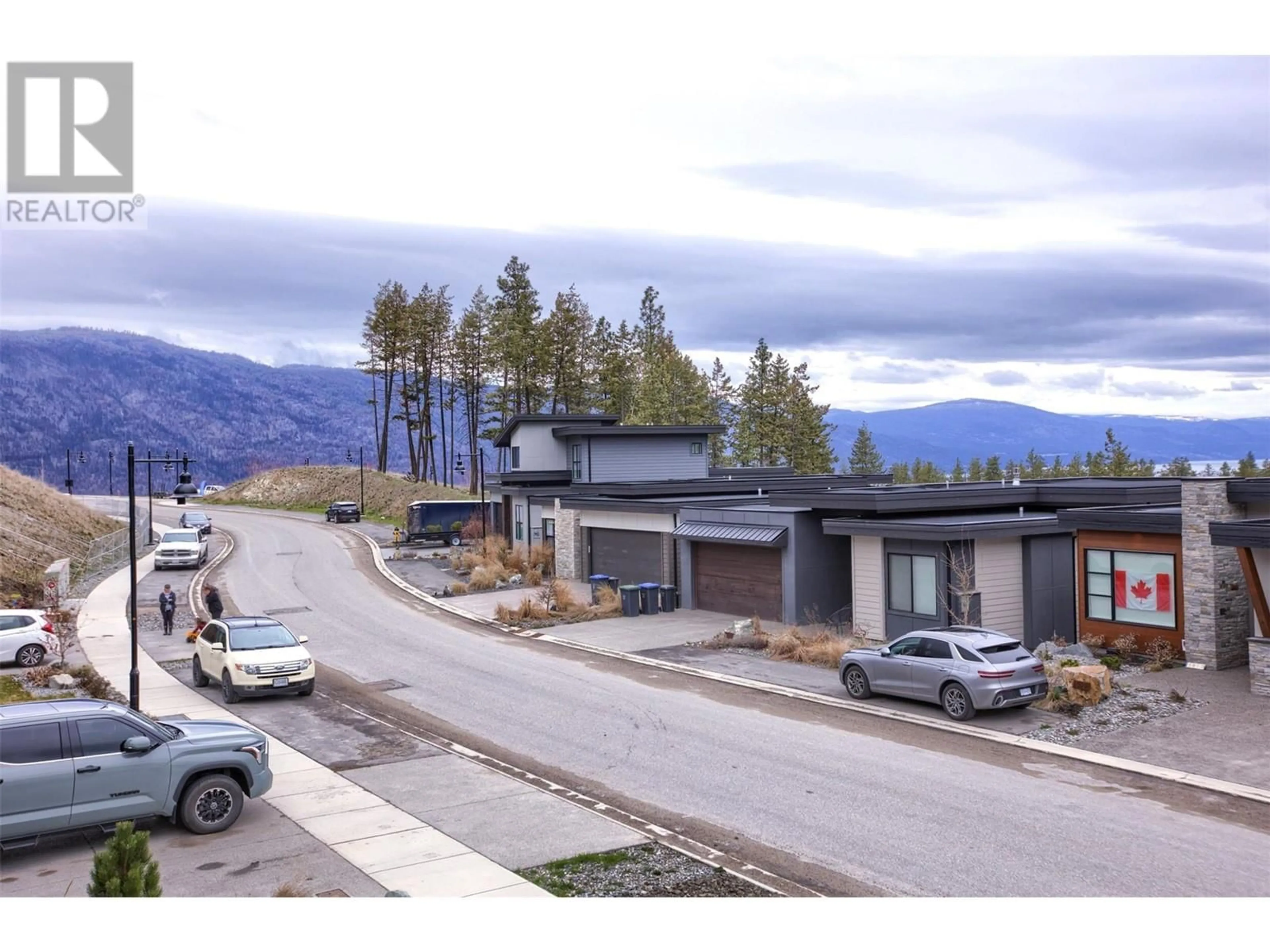 A pic from exterior of the house or condo, the street view for 1917 Northern Flicker Court, Kelowna British Columbia V1V0G3