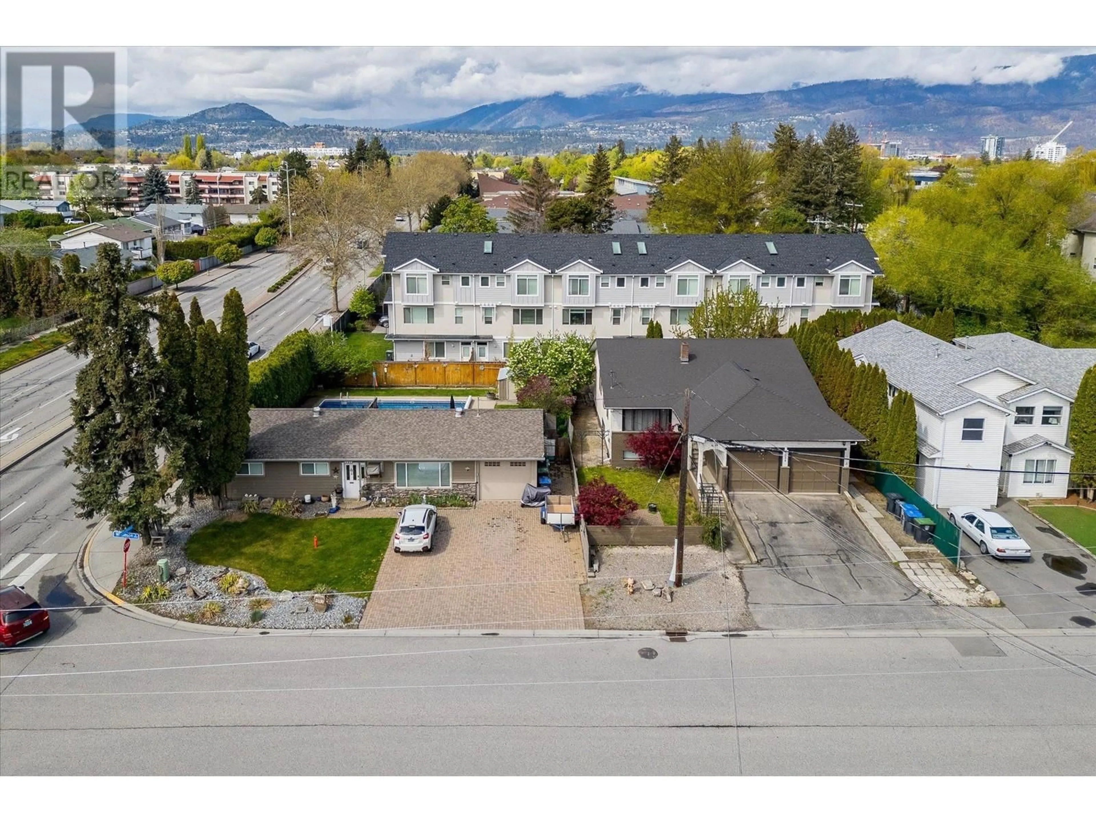 A pic from outside/outdoor area/front of a property/back of a property/a pic from drone, mountain view for 2030 WILKINSON STREET, Kelowna British Columbia V1Y3Z8