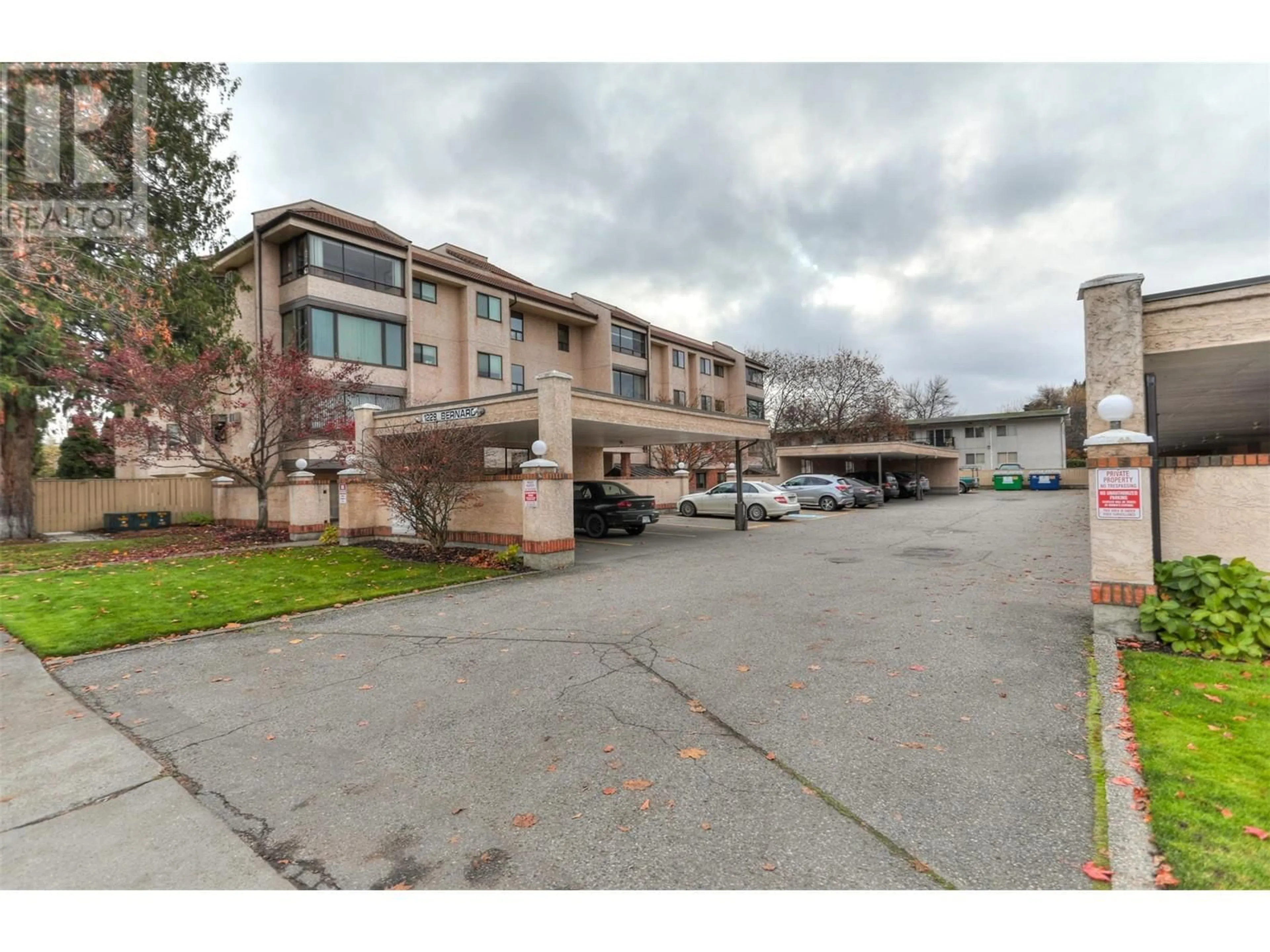 A pic from exterior of the house or condo, the street view for 1229 Bernard Avenue Unit# 102 Lot# 2, Kelowna British Columbia V1Y6R3