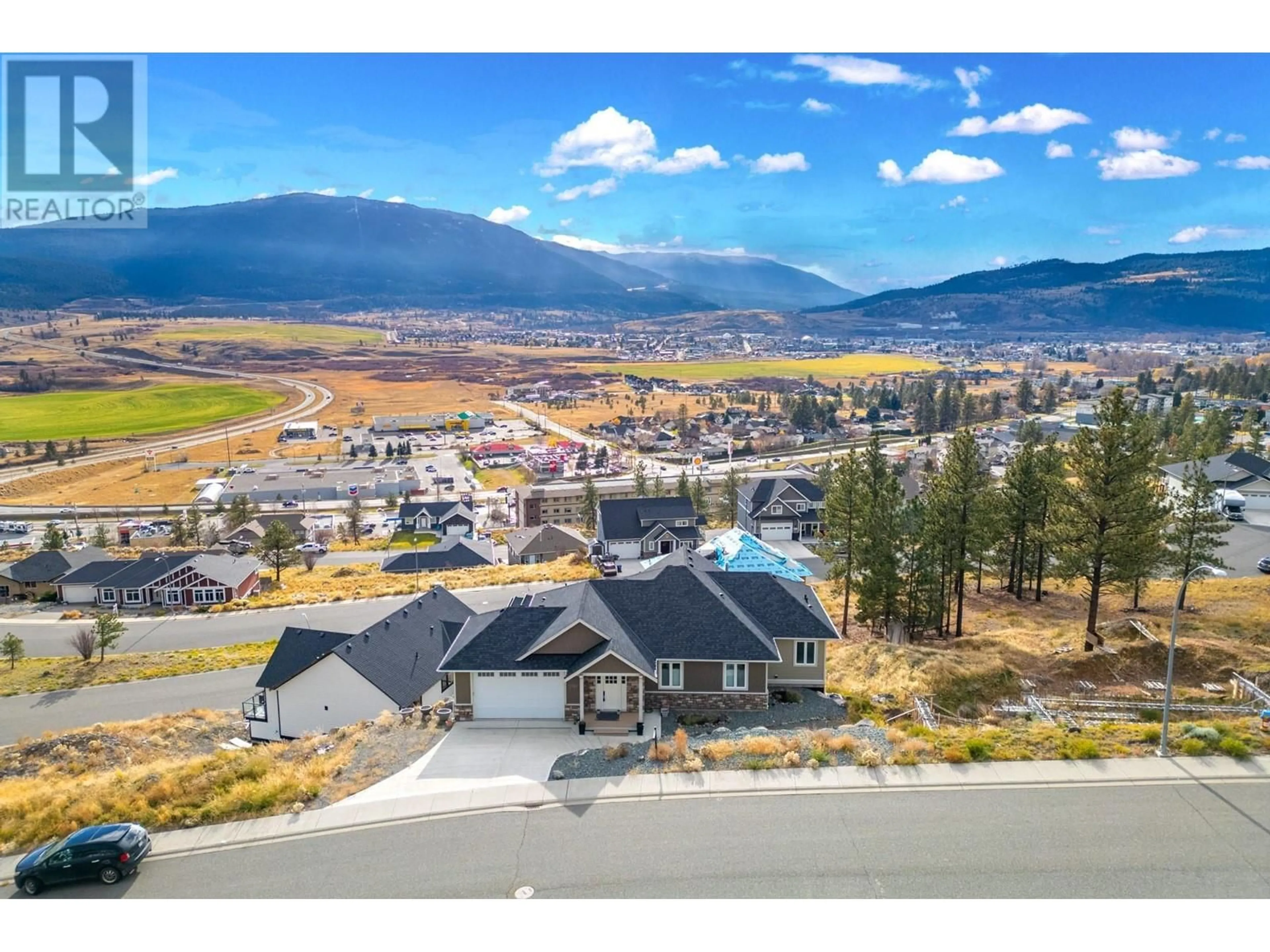 Frontside or backside of a home, the street view for 2760 PEREGRINE Way, Merritt British Columbia V1K0B4