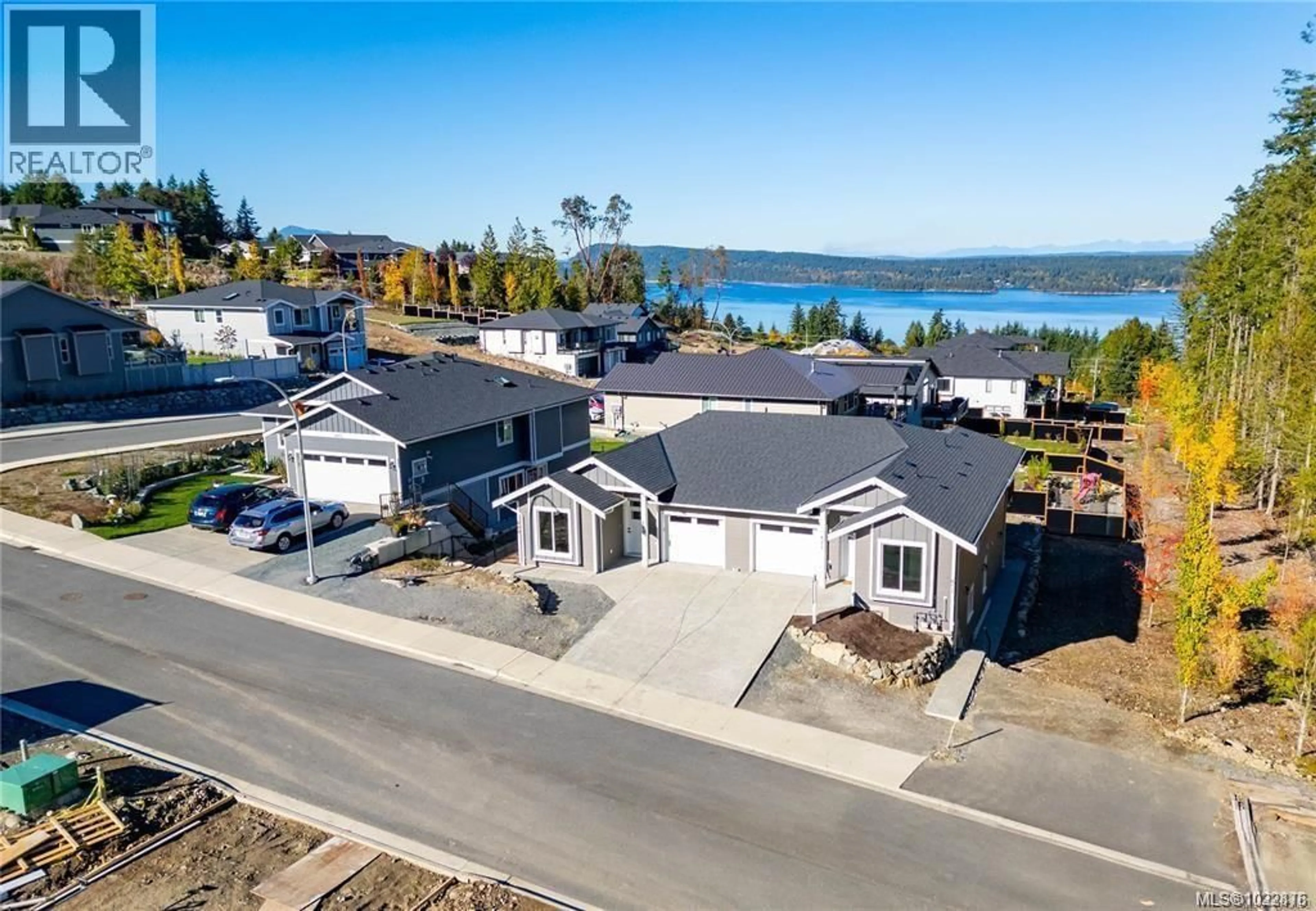 A pic from outside/outdoor area/front of a property/back of a property/a pic from drone, water/lake/river/ocean view for 669 SANDERSON ROAD, Ladysmith British Columbia V9G0A7