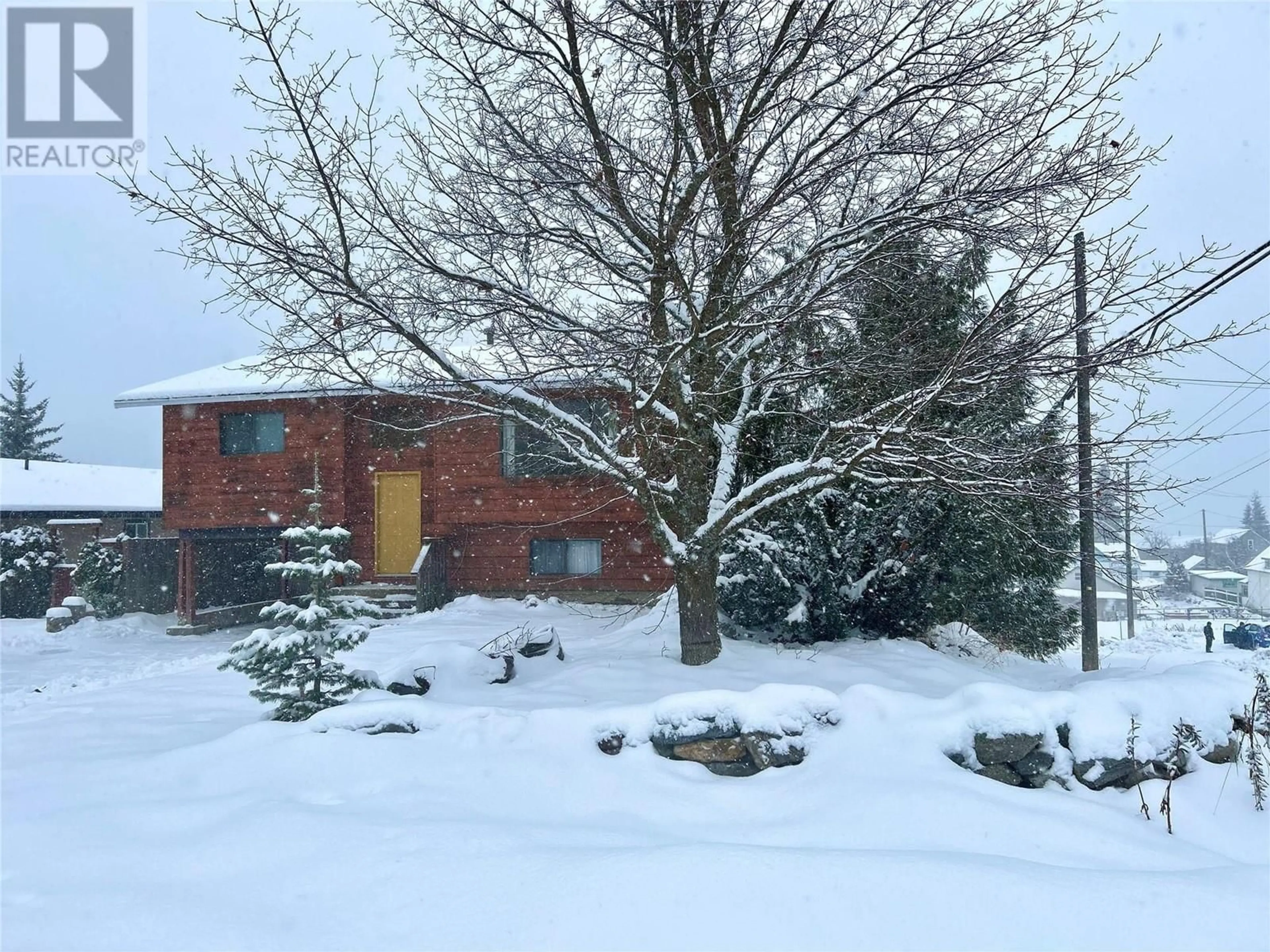 Frontside or backside of a home, the street view for 2203 Third Avenue, Rossland British Columbia V0G1Y0