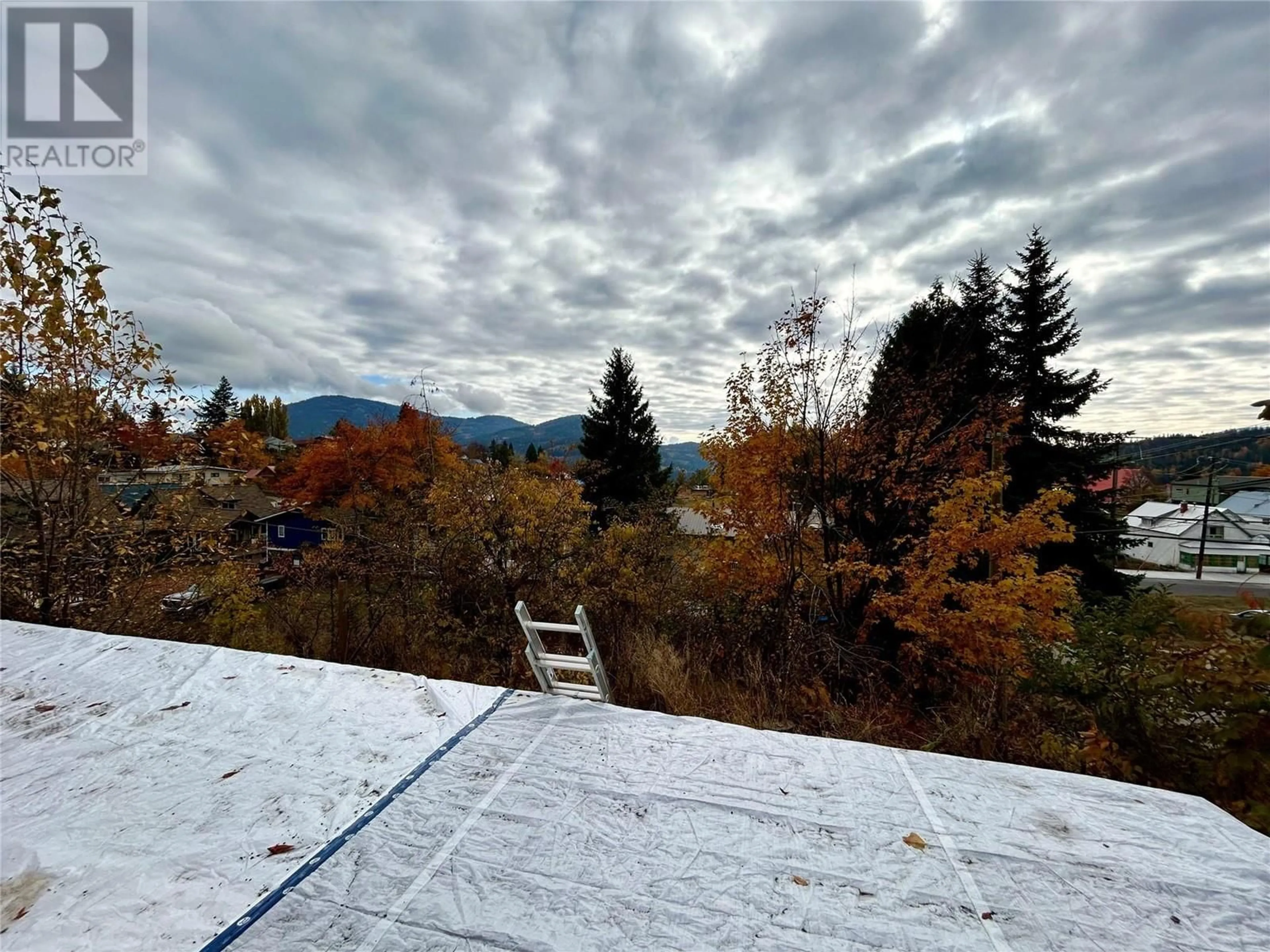 Frontside or backside of a home, the view of mountain for 2203 Third Avenue, Rossland British Columbia V0G1Y0